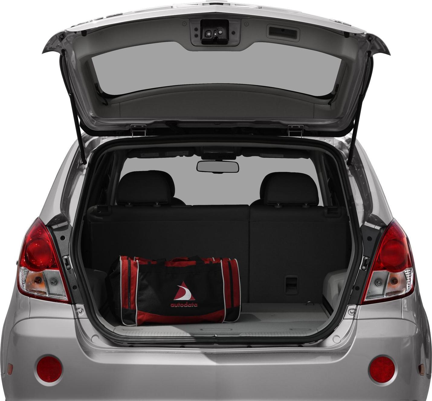 Rear open trunk space with red and black bag