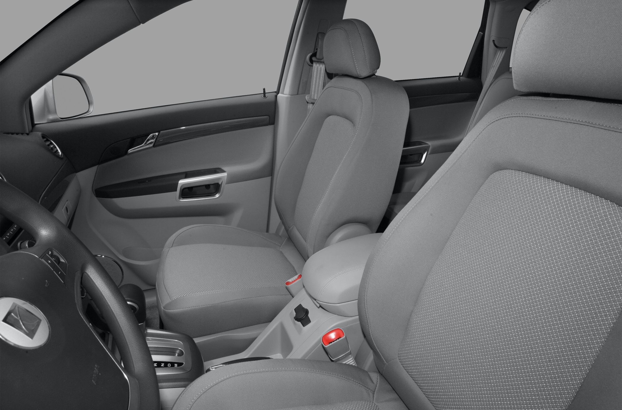 Front seats and center console with automatic gear shift and armrest