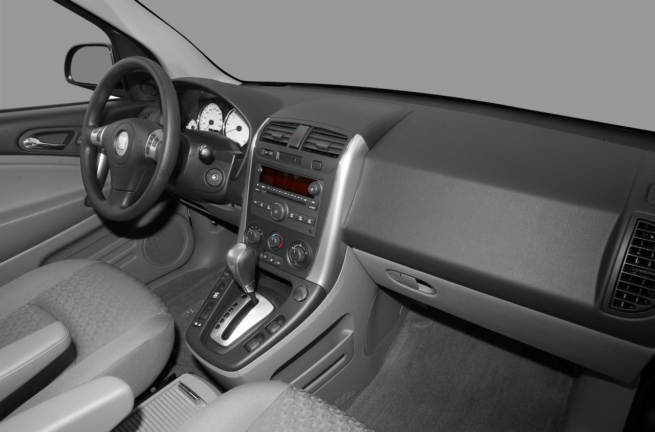 Interior dashboard and center console with steering wheel and gear shift