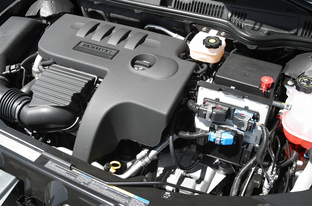 Close-up of an Ecotec engine and components in an engine bay