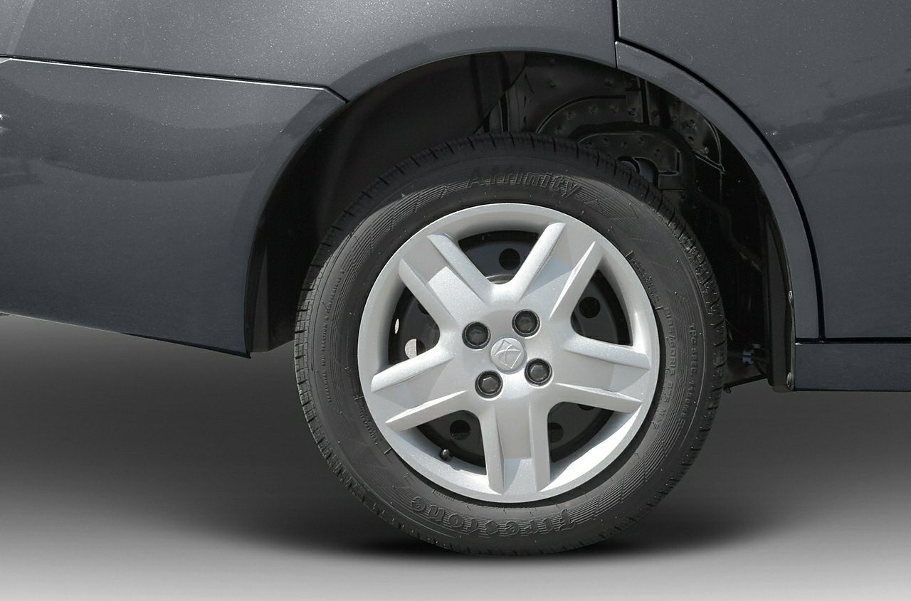 Close-up of alloy wheel and tire of a vehicle.