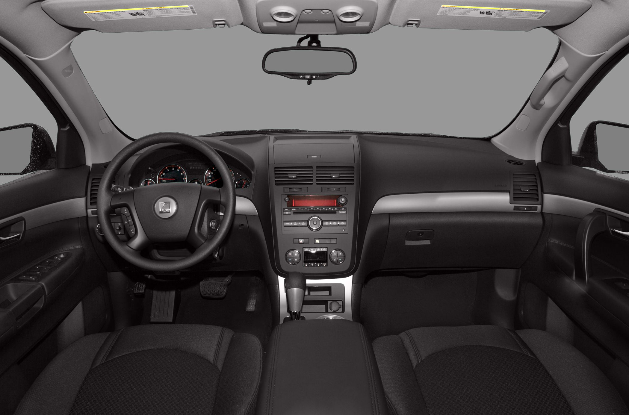 Dashboard layout and steering wheel with center console
