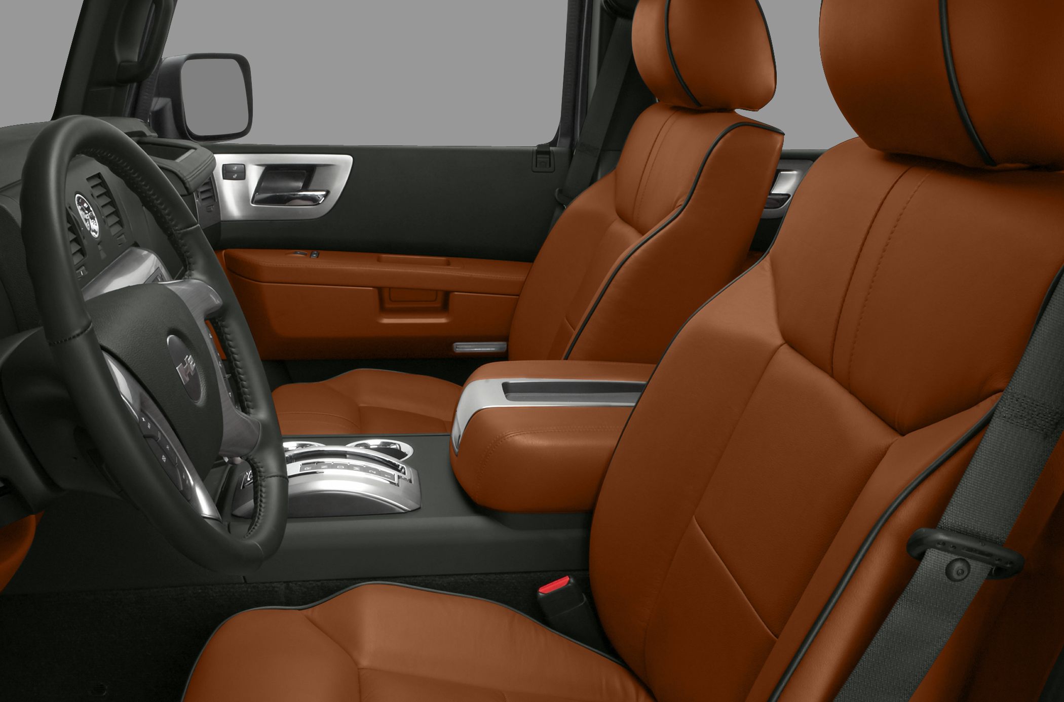 Brown leather seats with black piping and modern center console.