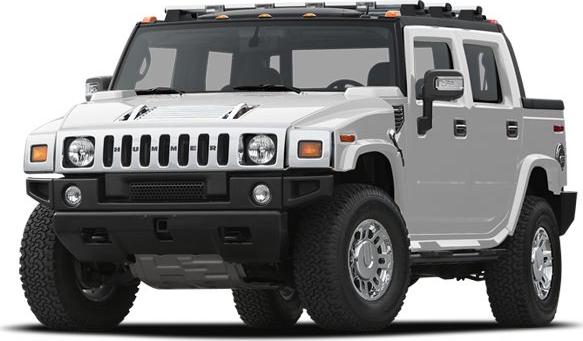 Front view of a rugged pickup with distinctive grille and large tires