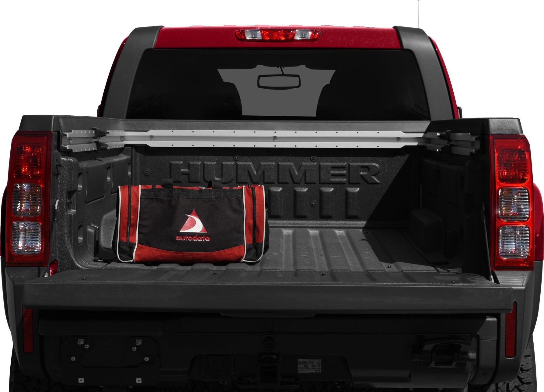 Open truck bed with branded liner and tool bag