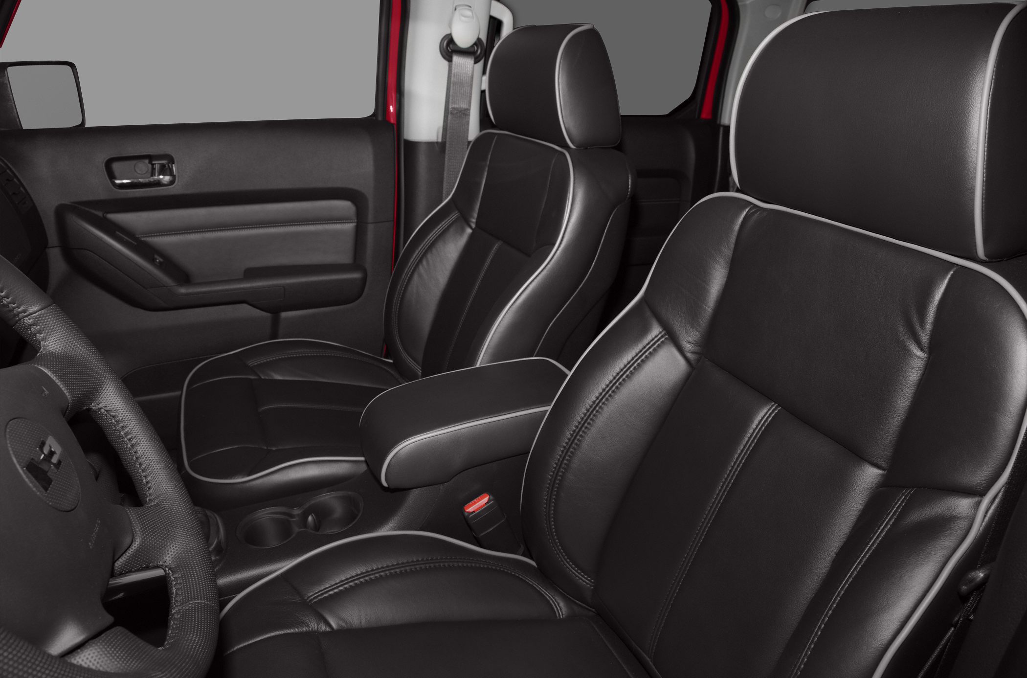 Black leather seats with contrast piping and front cabin details