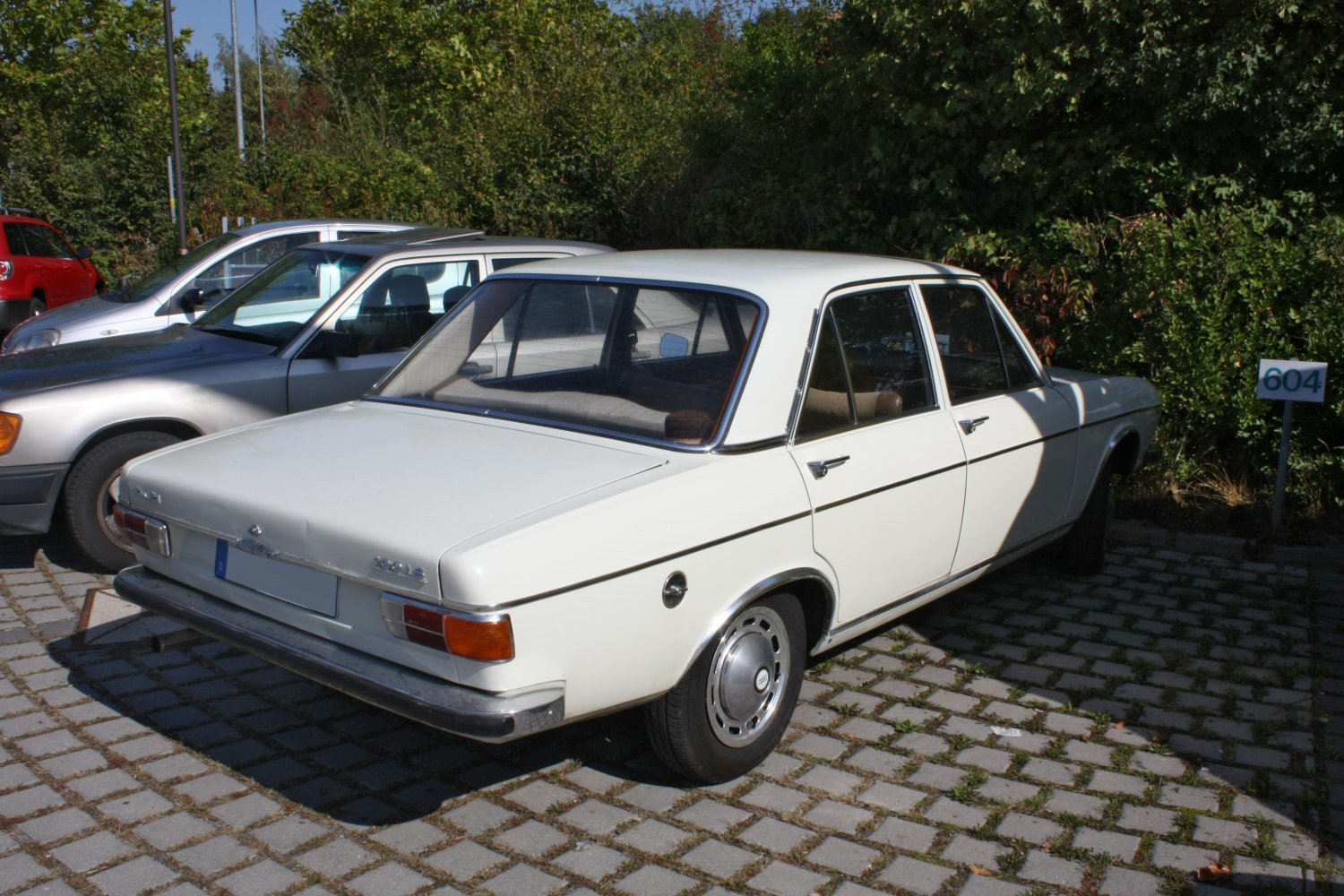 Classic vintage sedan rear and side view with chrome details.