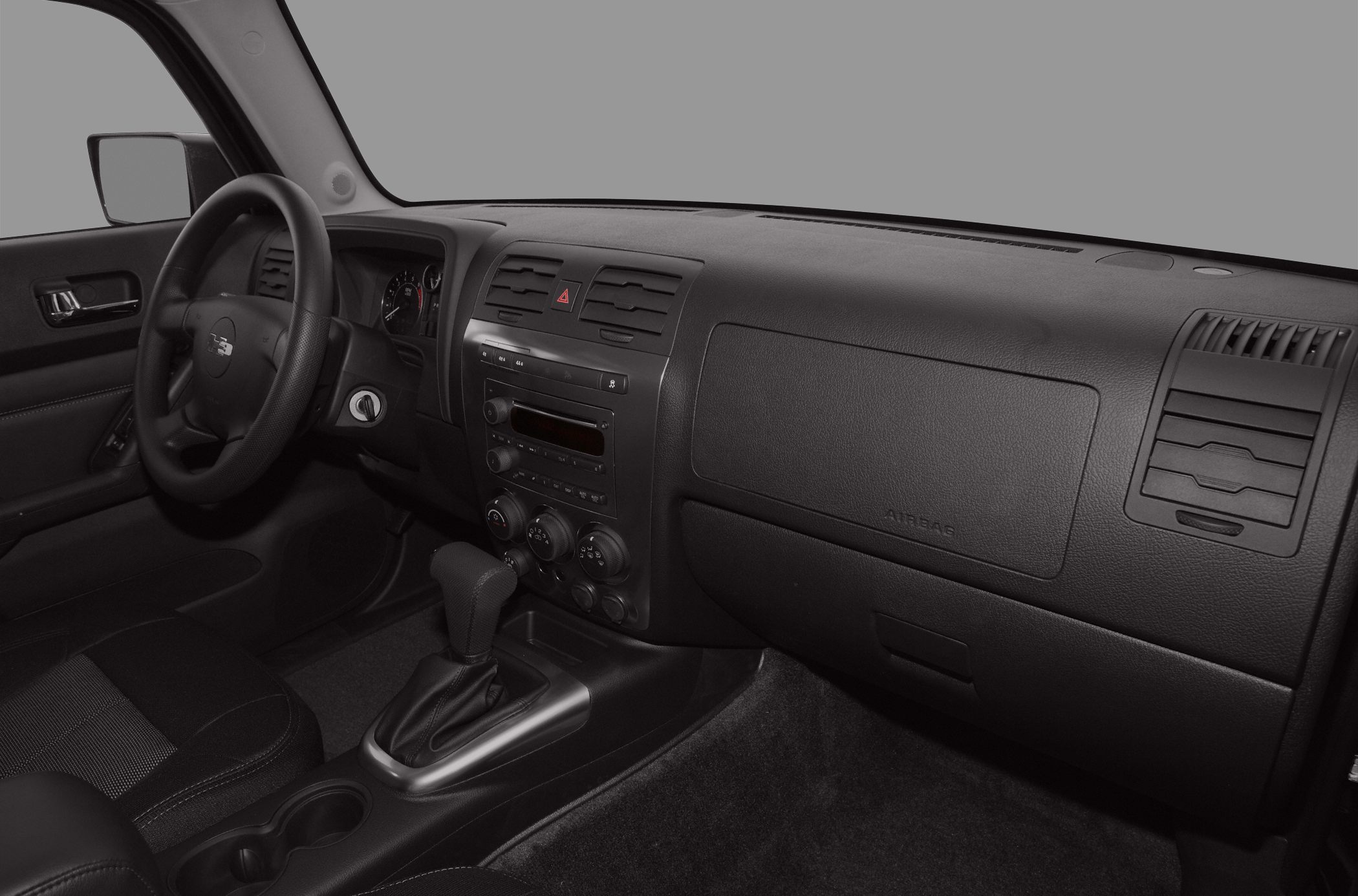 Interior dashboard and steering wheel with gear shift and controls