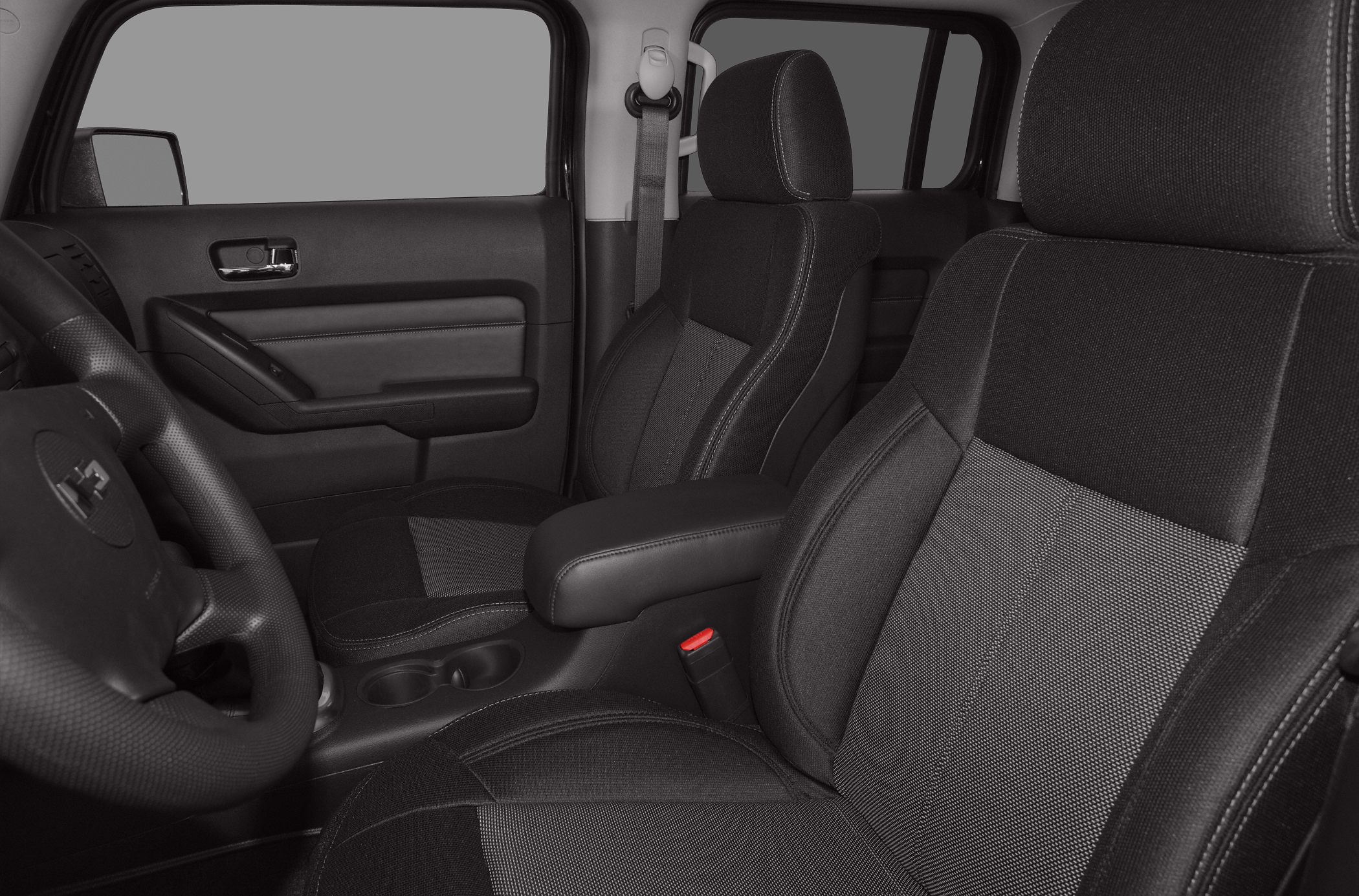 Fabric seats and door panel with center console in vehicle interior
