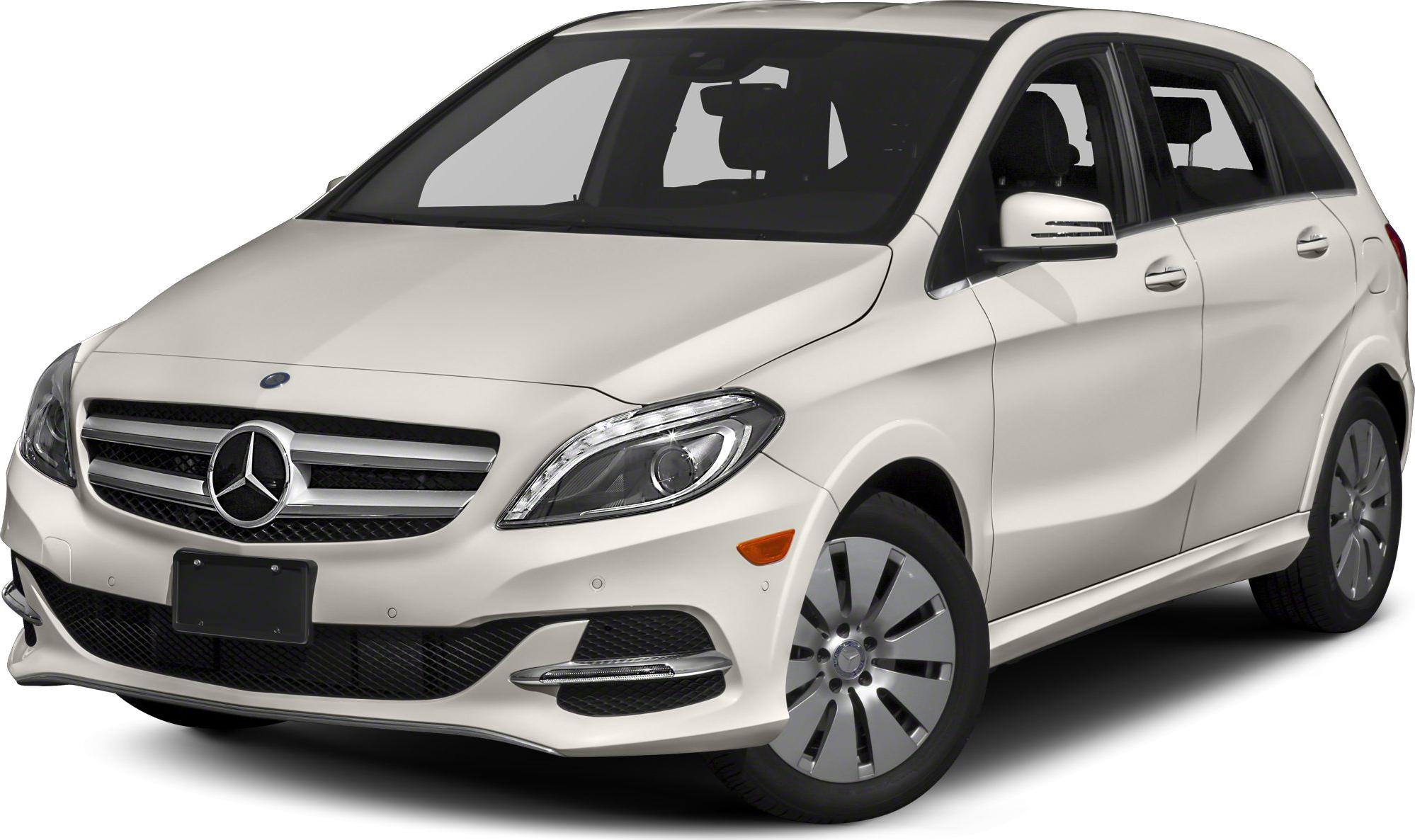Front three-quarter view of white hatchback with distinct headlights and grille