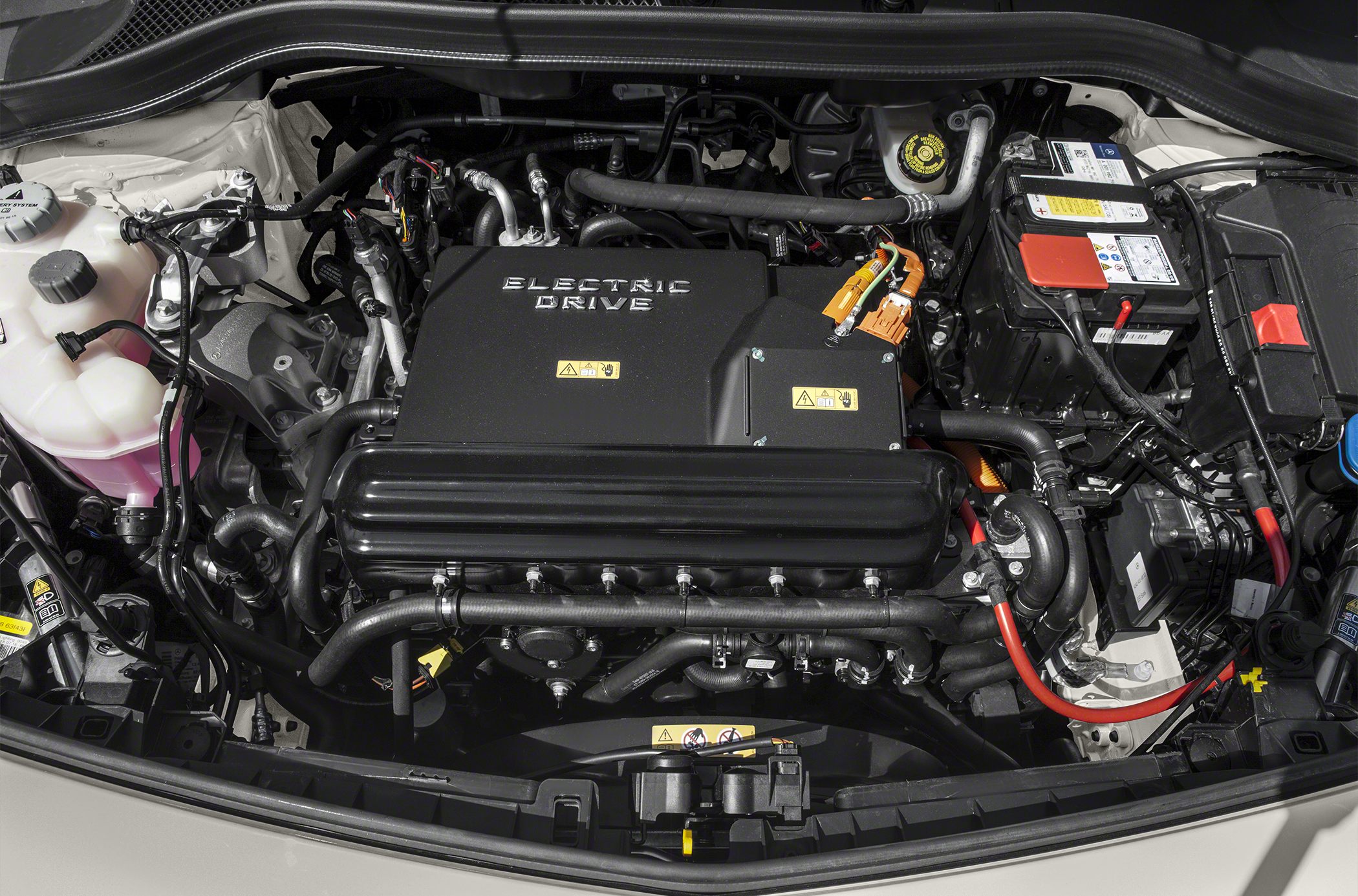 Electric drive system with wiring, battery, and coolant reservoir