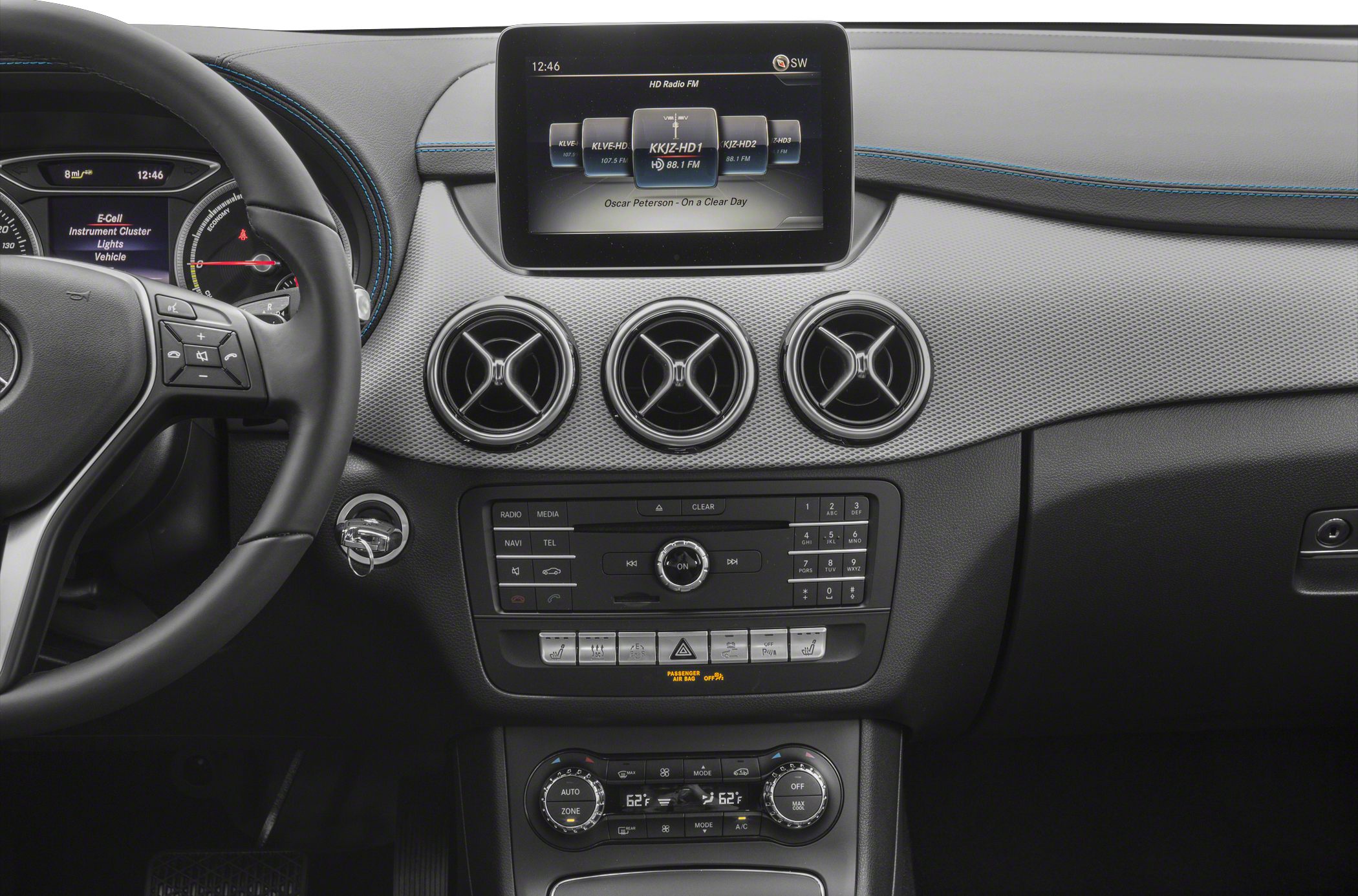 Mercedes-Benz car interior dashboard with round air vents and infotainment screen