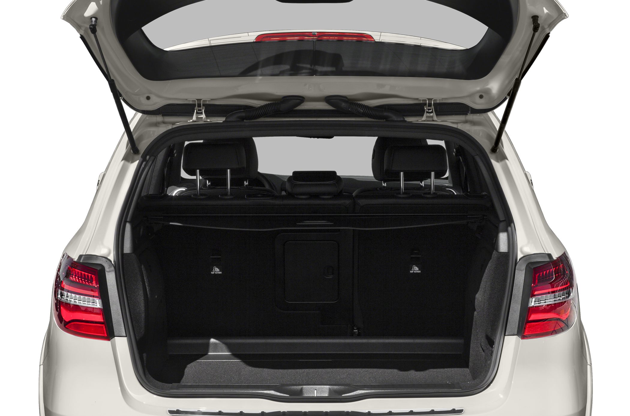 Open rear trunk with spacious cargo area and rear seats.