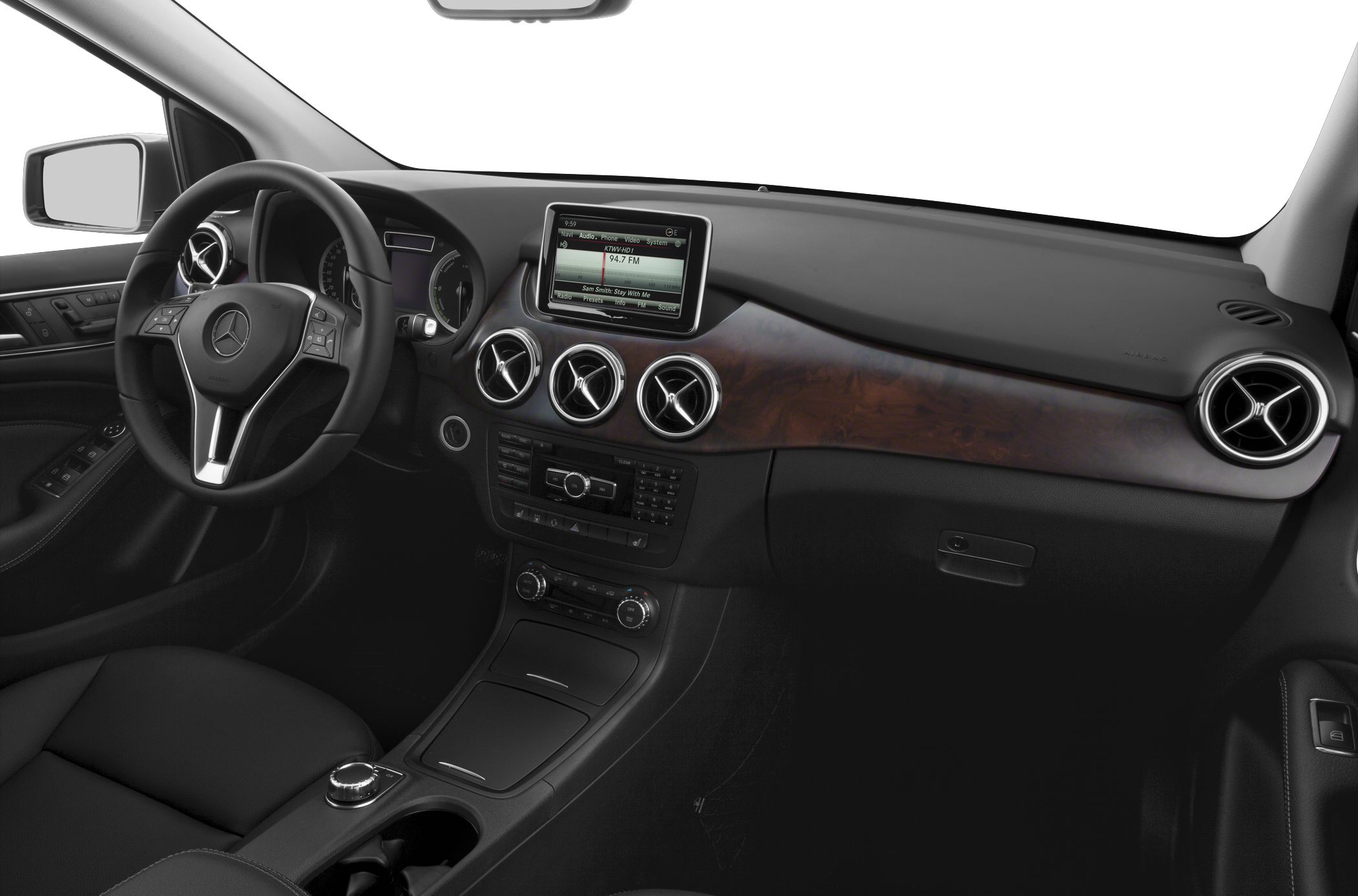 Dashboard with wood trim, infotainment screen, steering wheel with controls