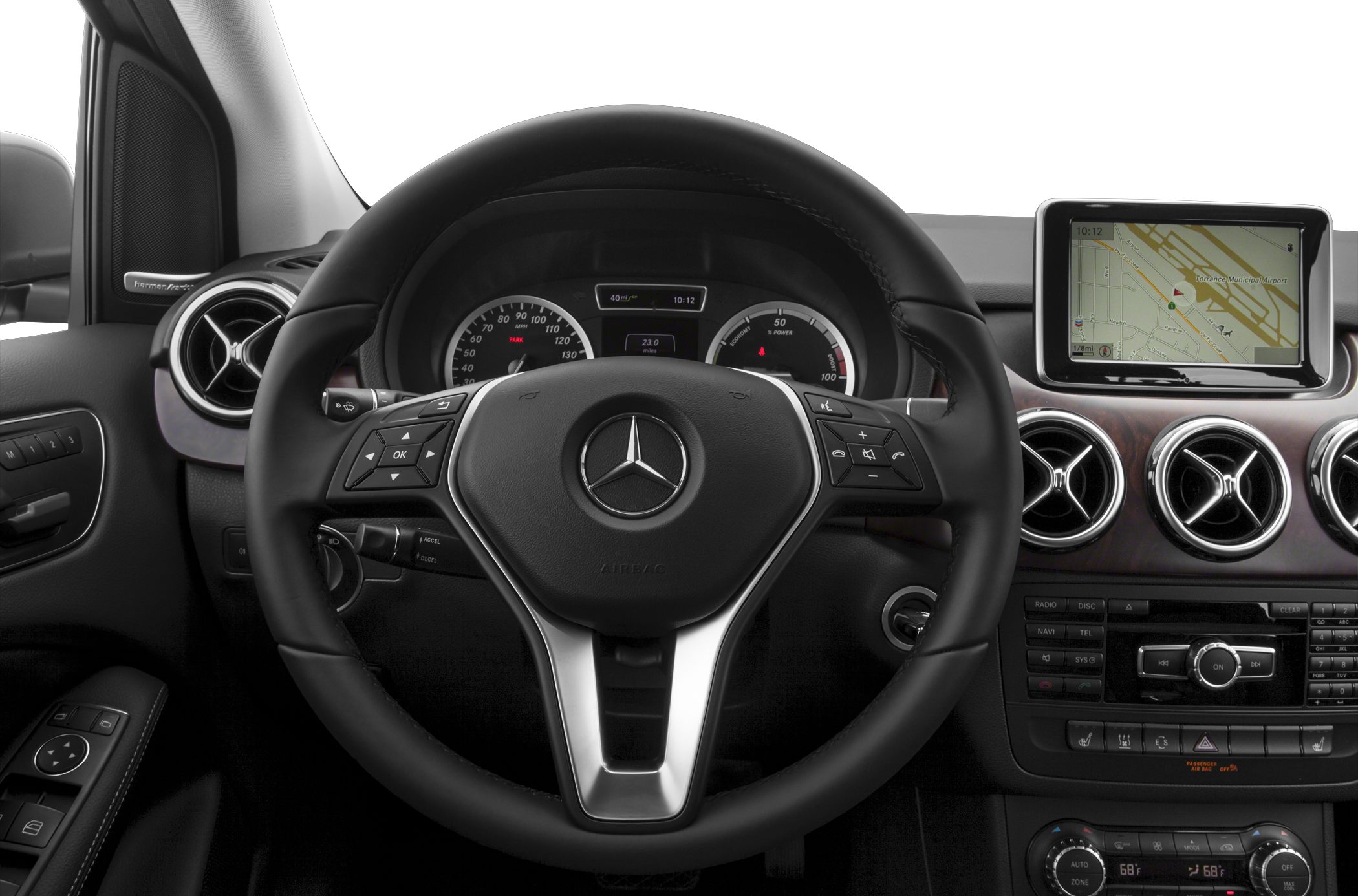 Steering wheel, dashboard instruments, navigation screen, air vents.