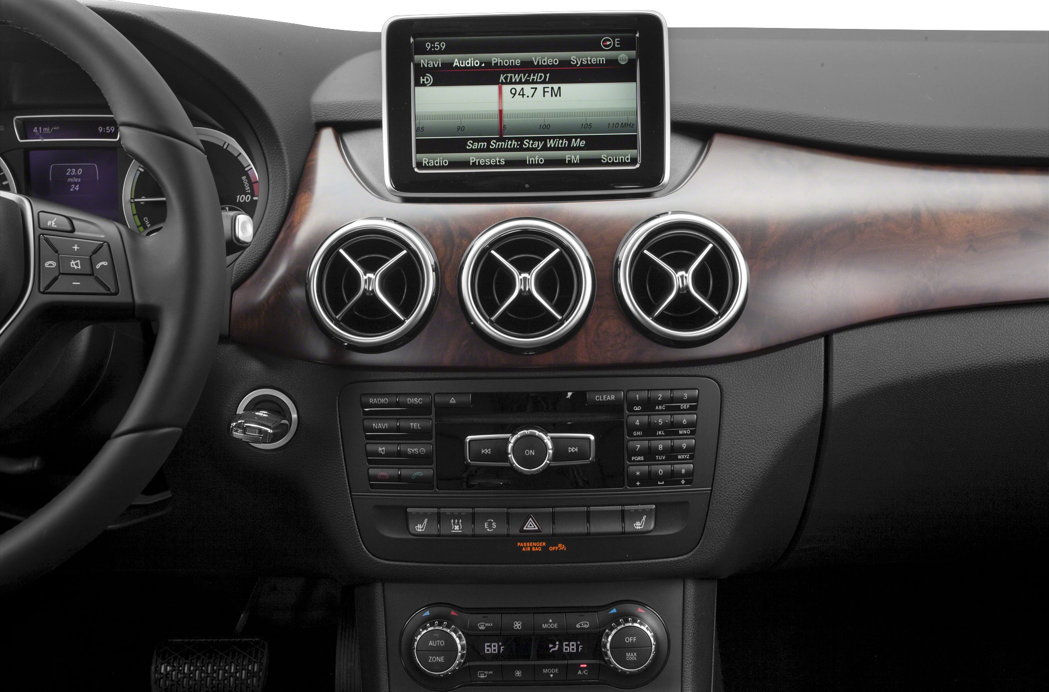 Dashboard with circular air vents and central infotainment display