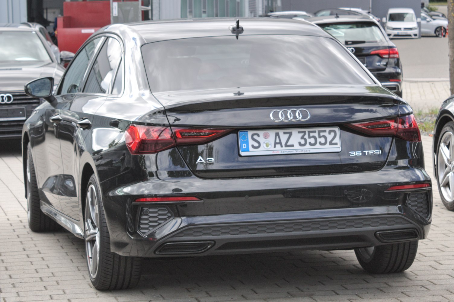 Rear view of sedan with angular taillights and 35 TFSI badge