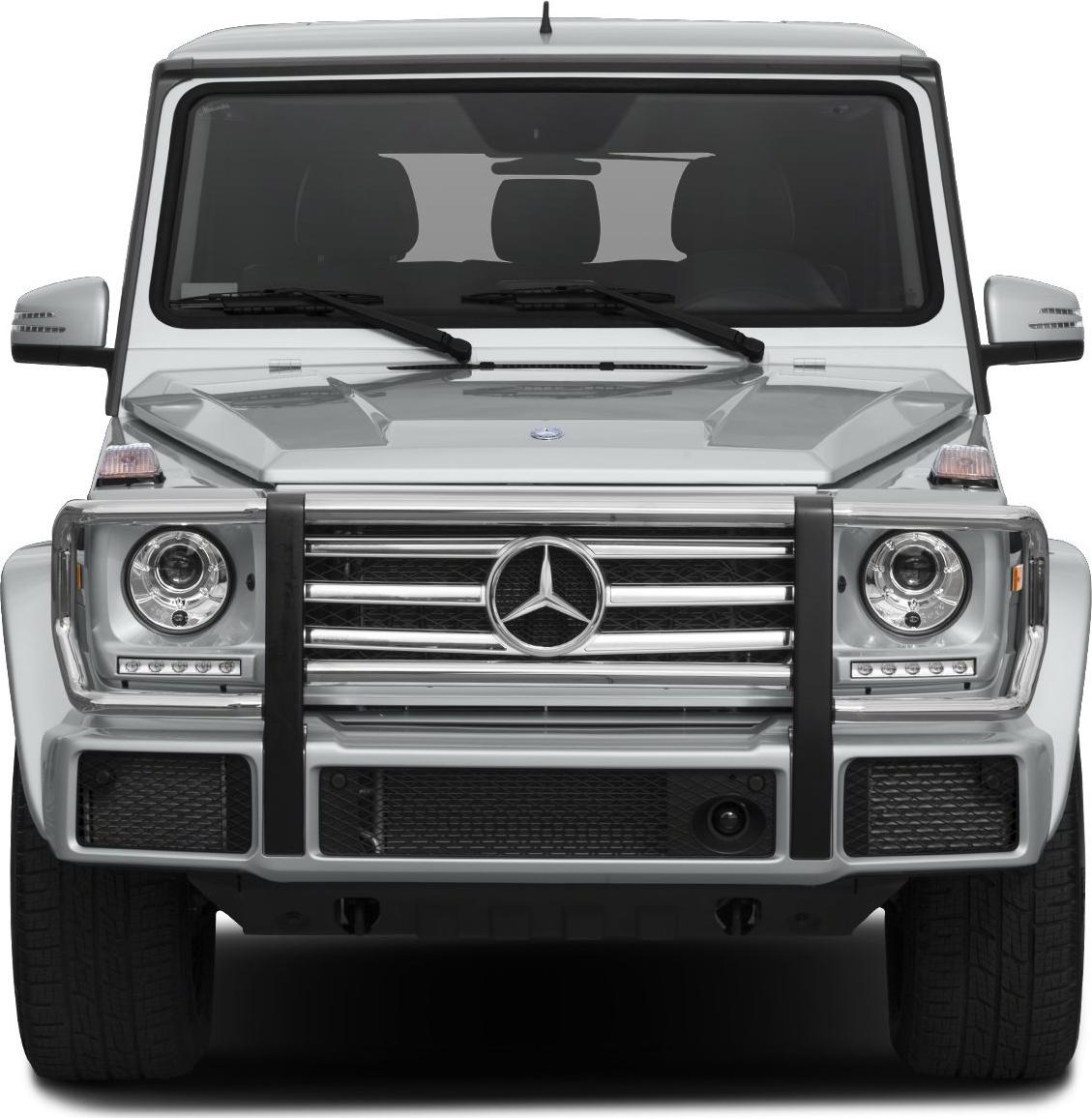 Front view showing round headlights and prominent grille with protective bars