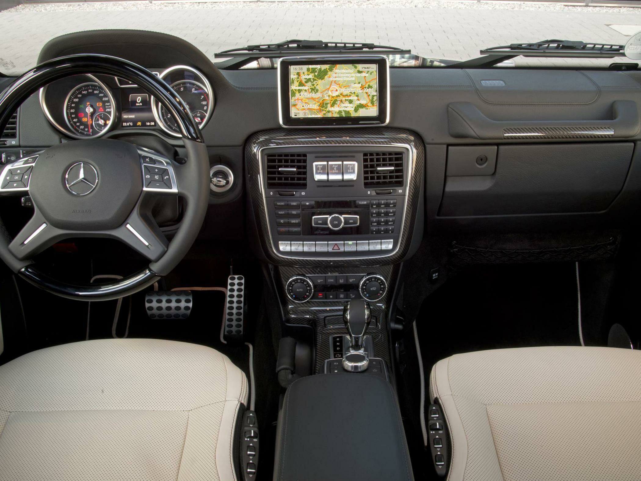 Dashboard with digital navigation screen and carbon fiber trim