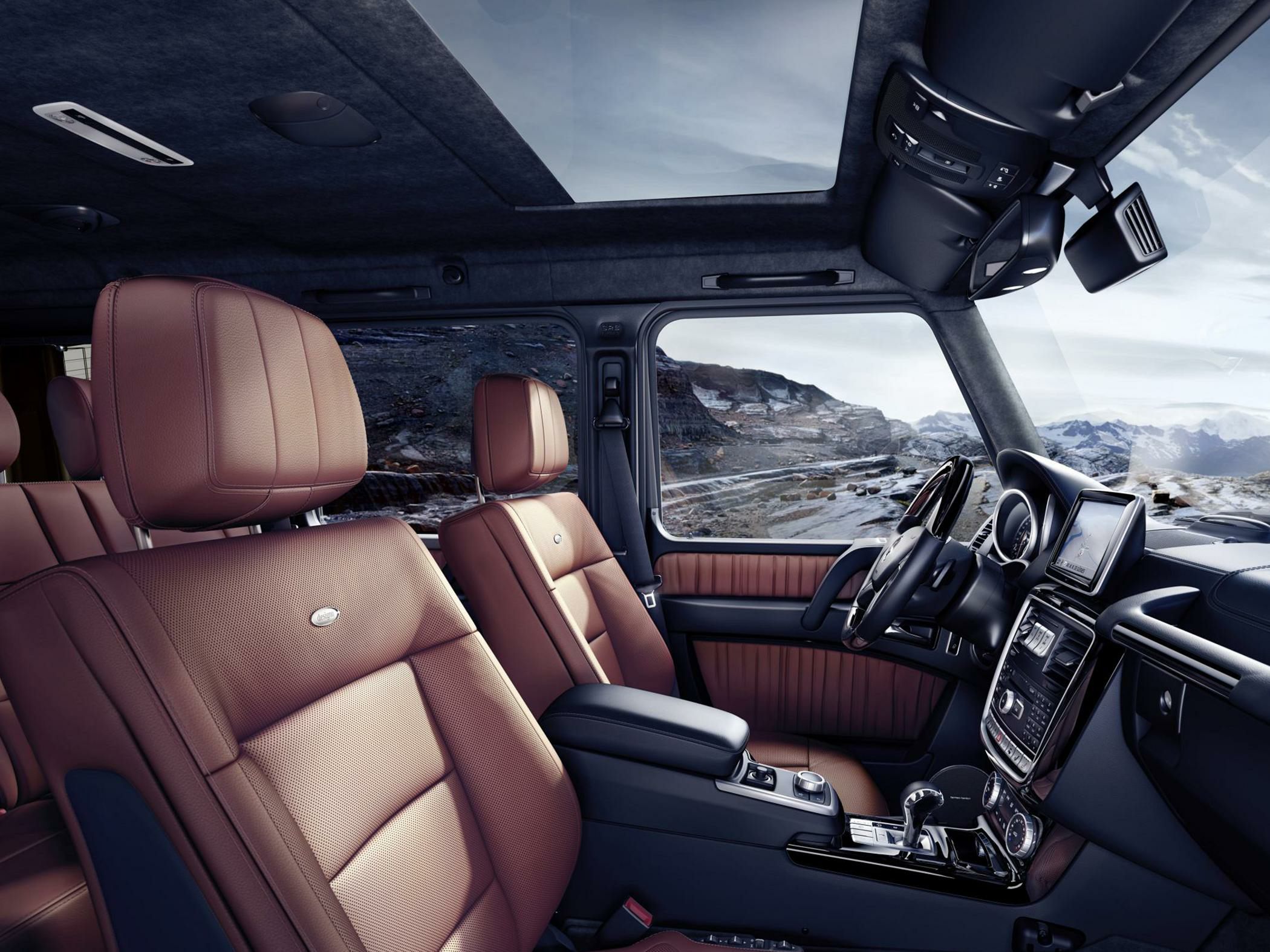 Premium brown leather seats with panoramic sunroof in luxury SUV interior