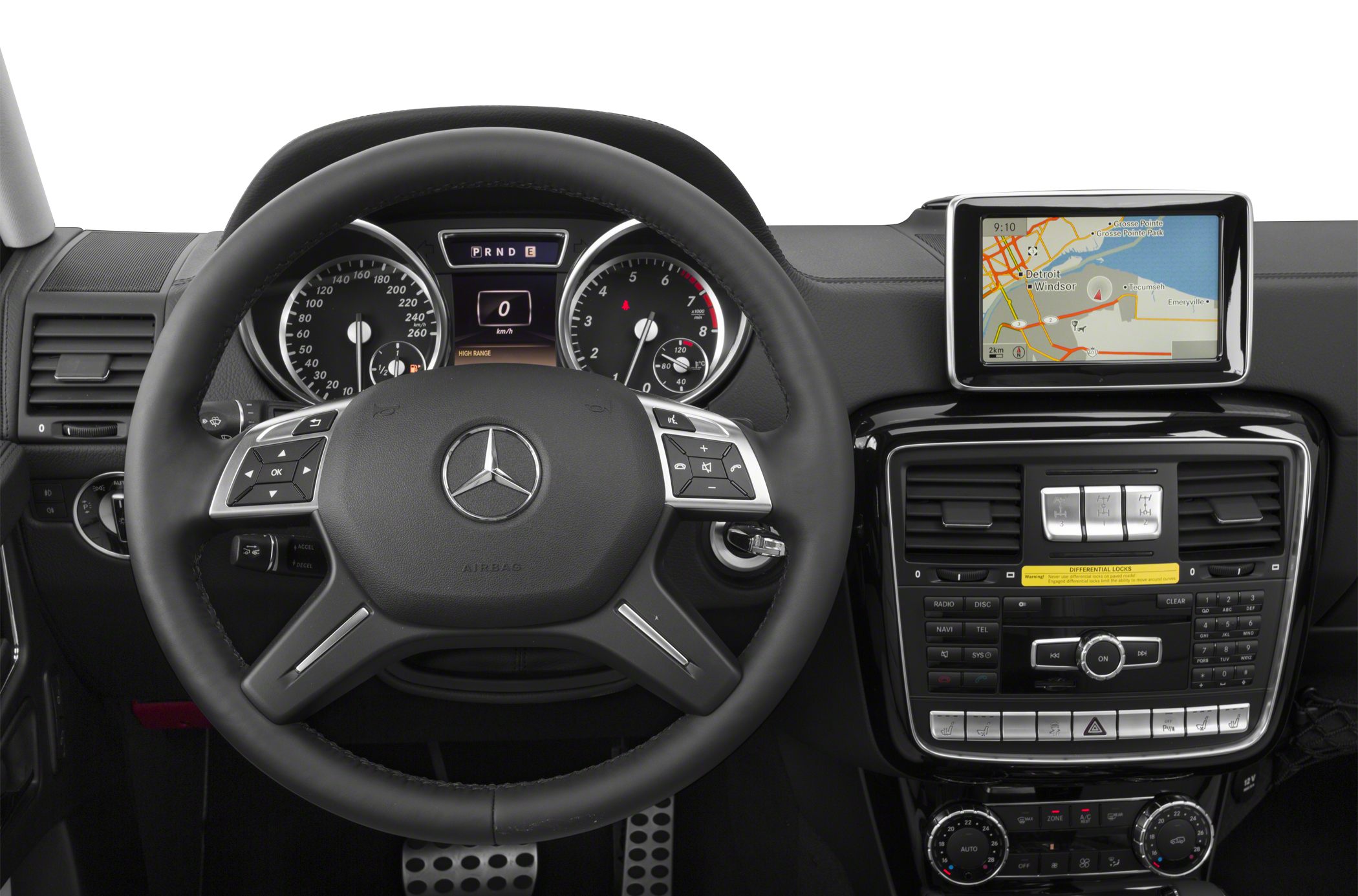 Steering wheel with control buttons and center console with navigation display
