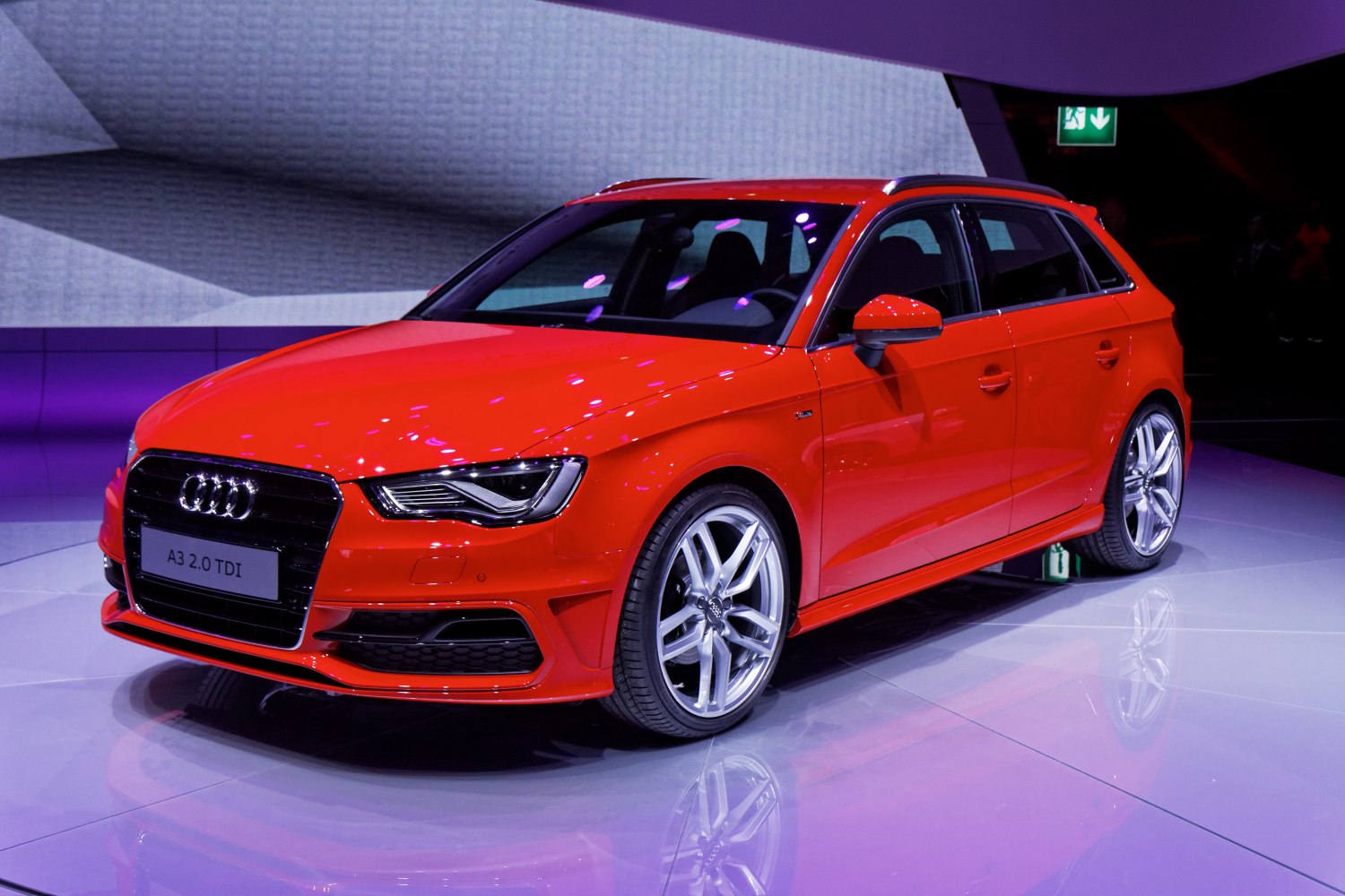 Red hatchback with LED headlights and alloy wheels
