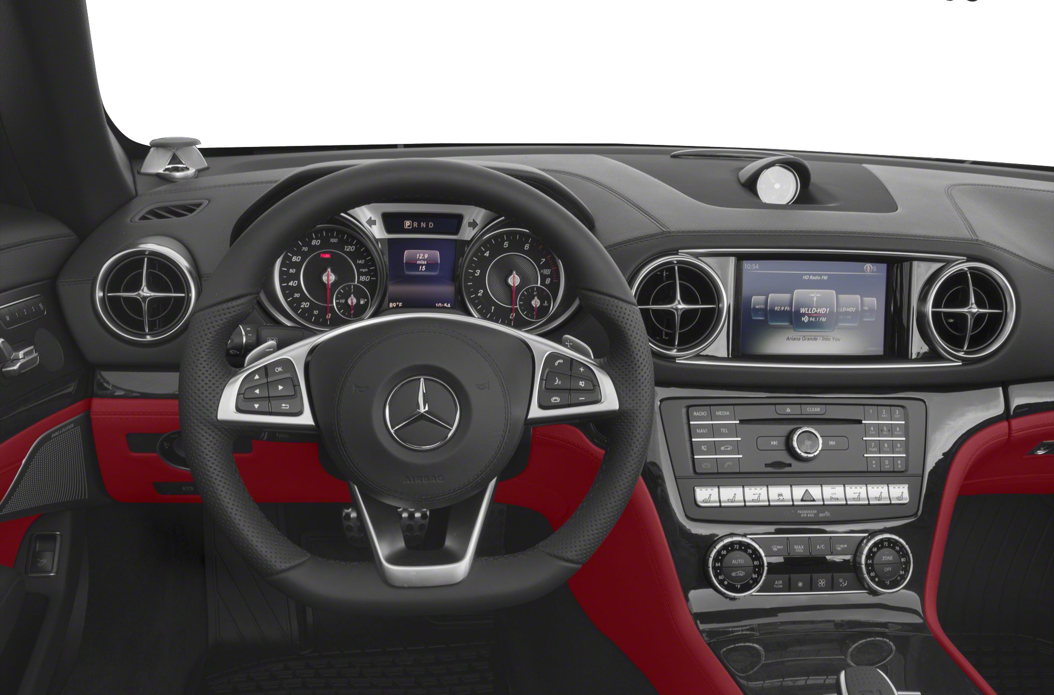 Dashboard and steering wheel with dual air vents and infotainment display