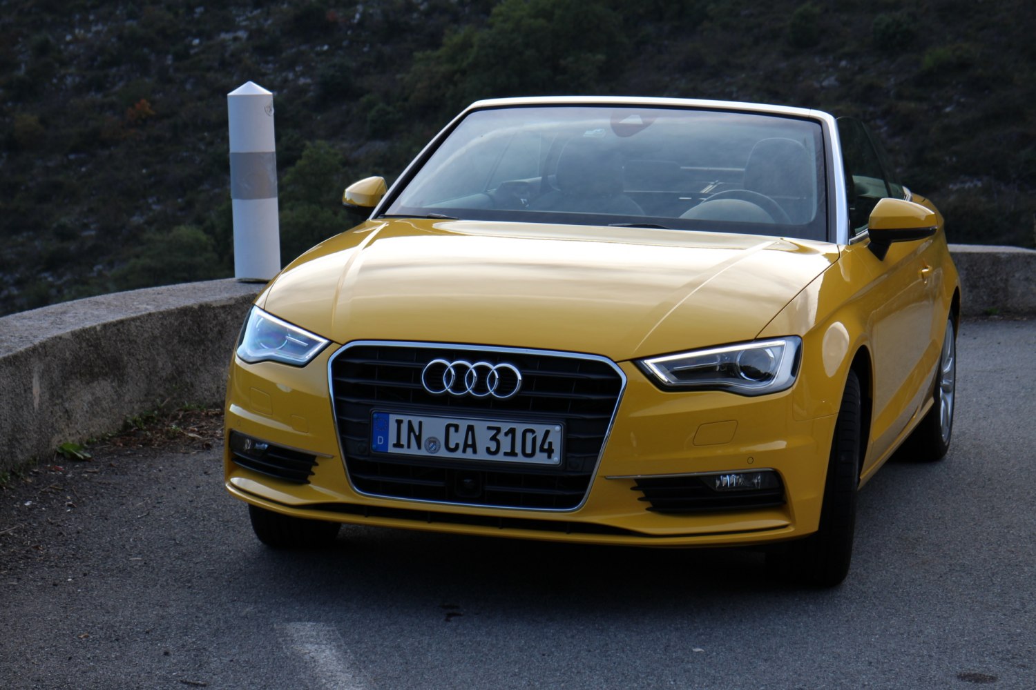 Yellow convertible with LED headlights front view
