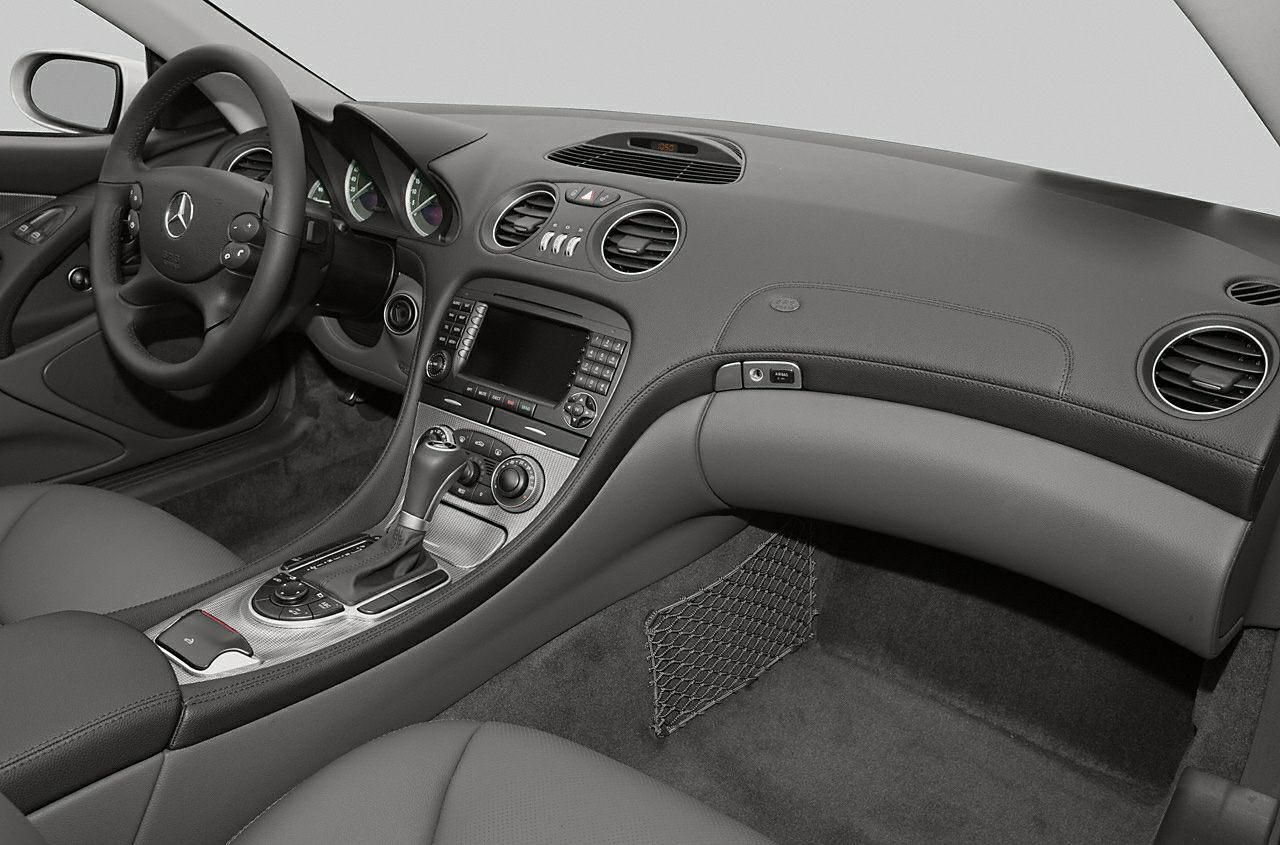 Dashboard, center console, steering wheel, climate control vents