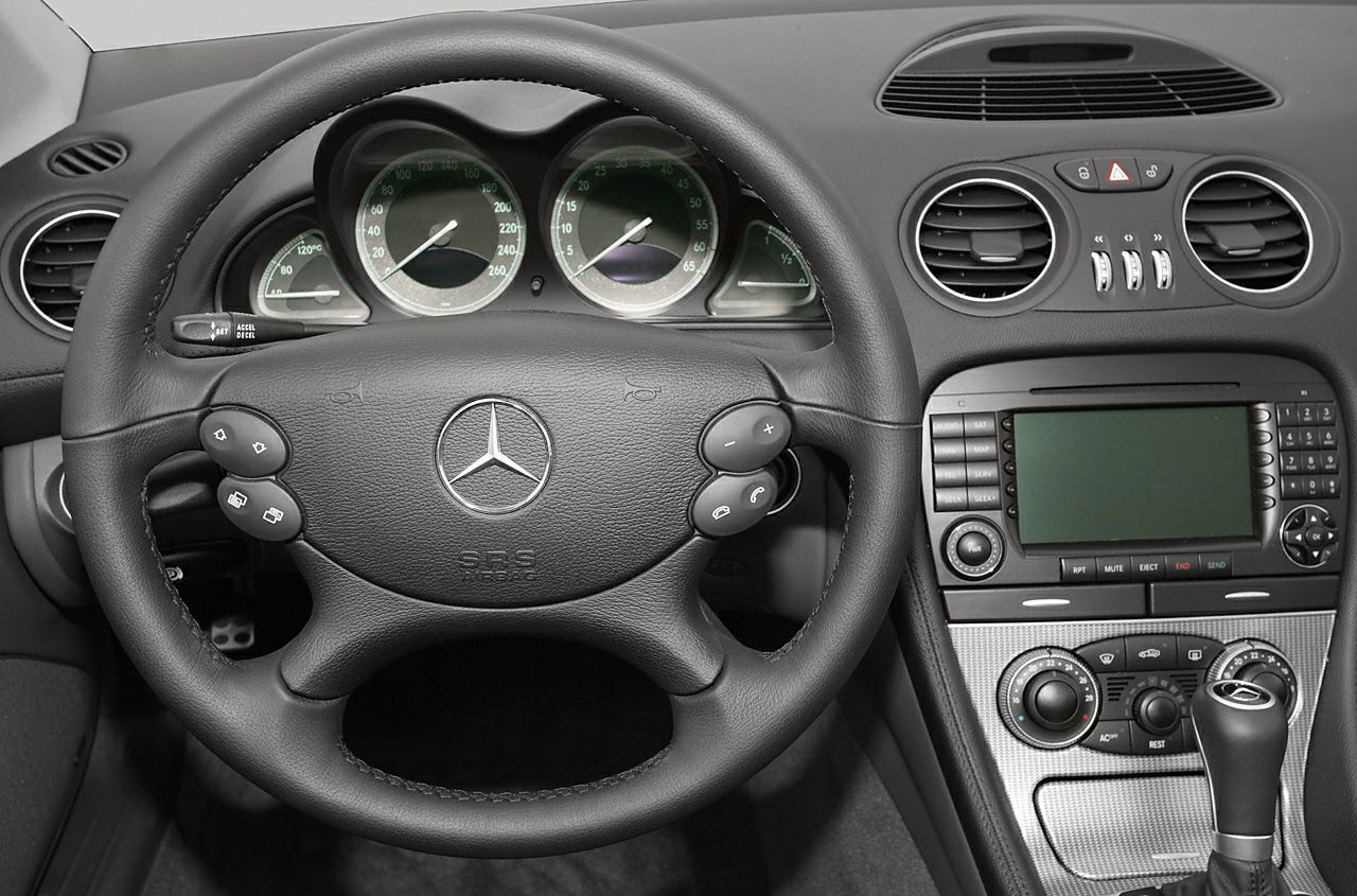 Steering wheel, instrument cluster, center console with multimedia and climate controls