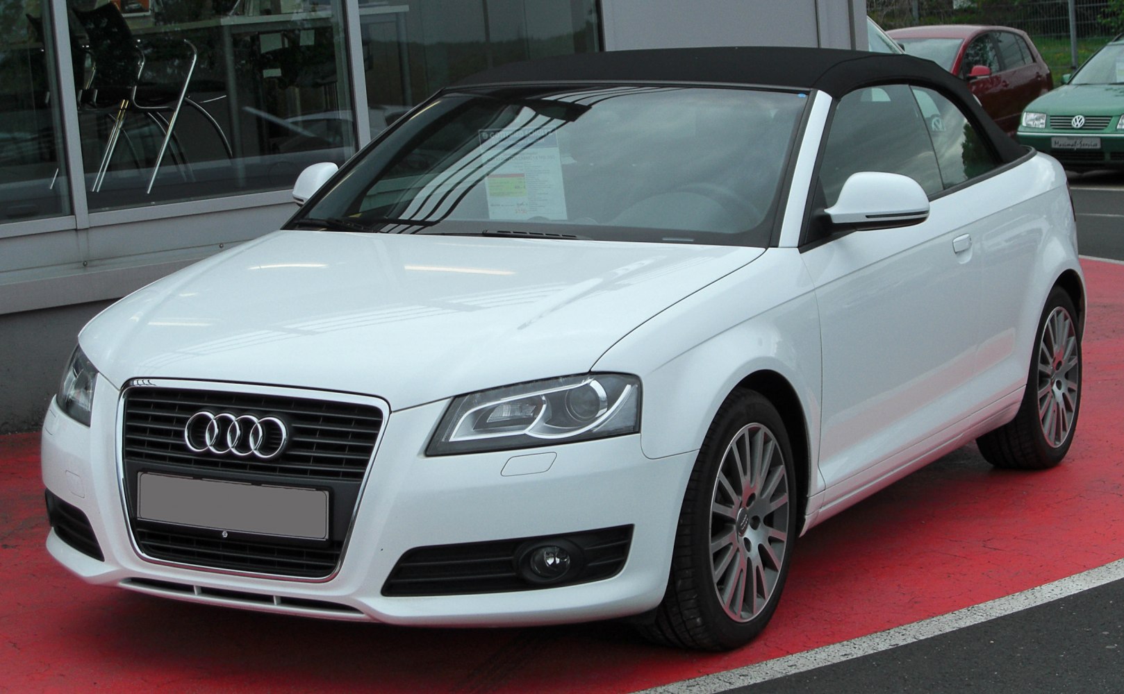 White convertible with soft top and LED headlights