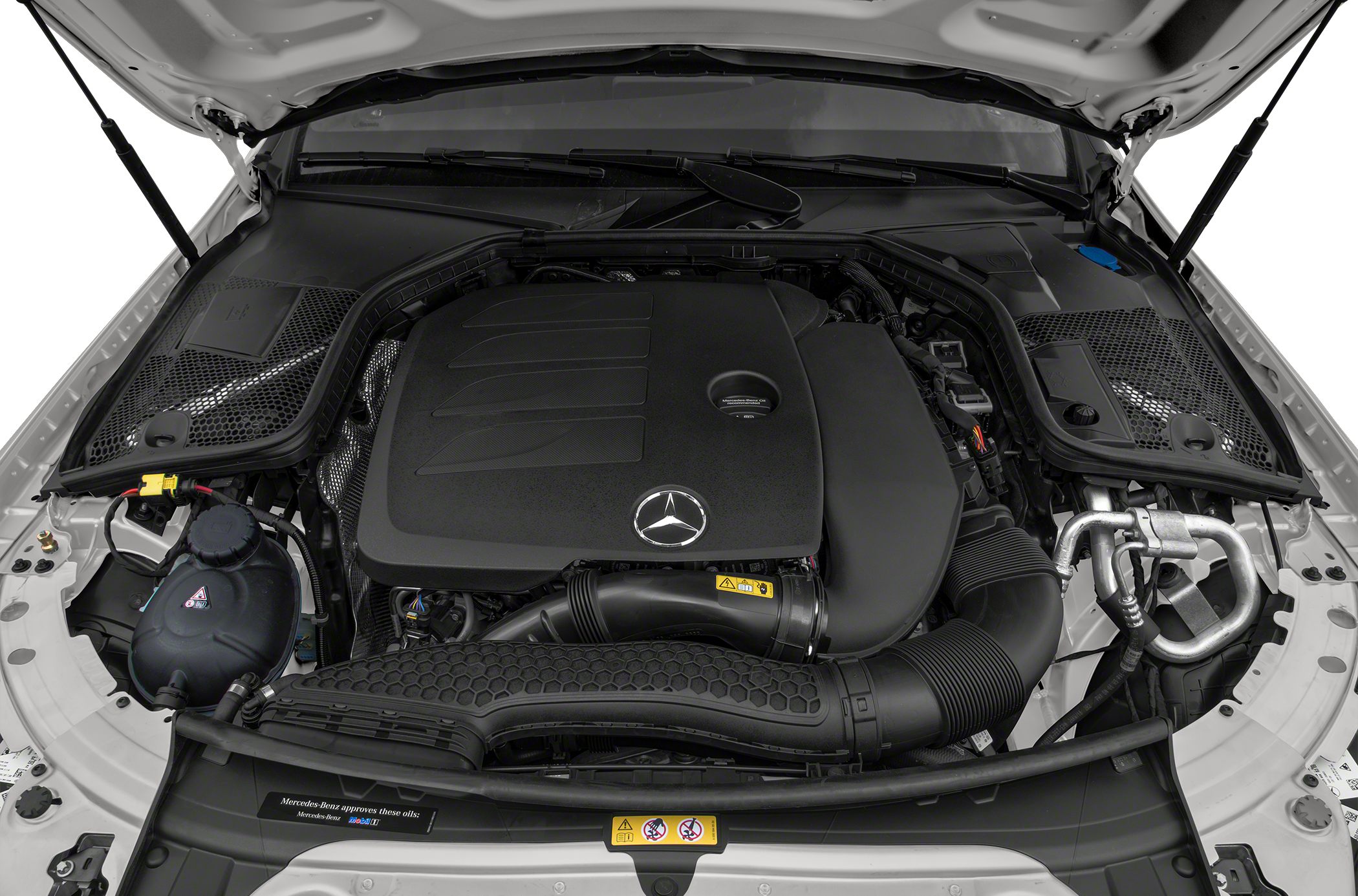 Engine bay with prominent engine cover and components.