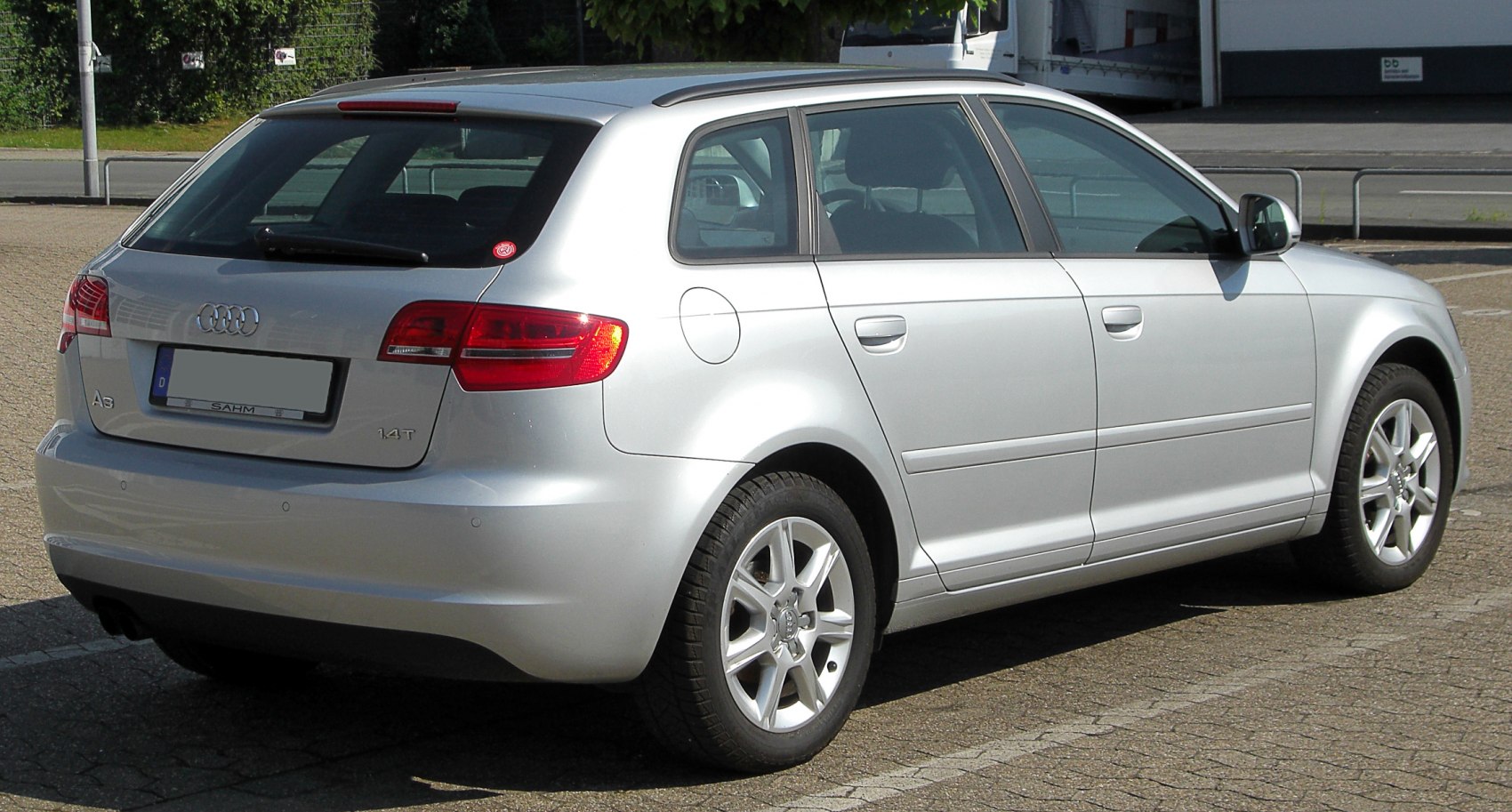 Silver hatchback rear side view with alloy wheels