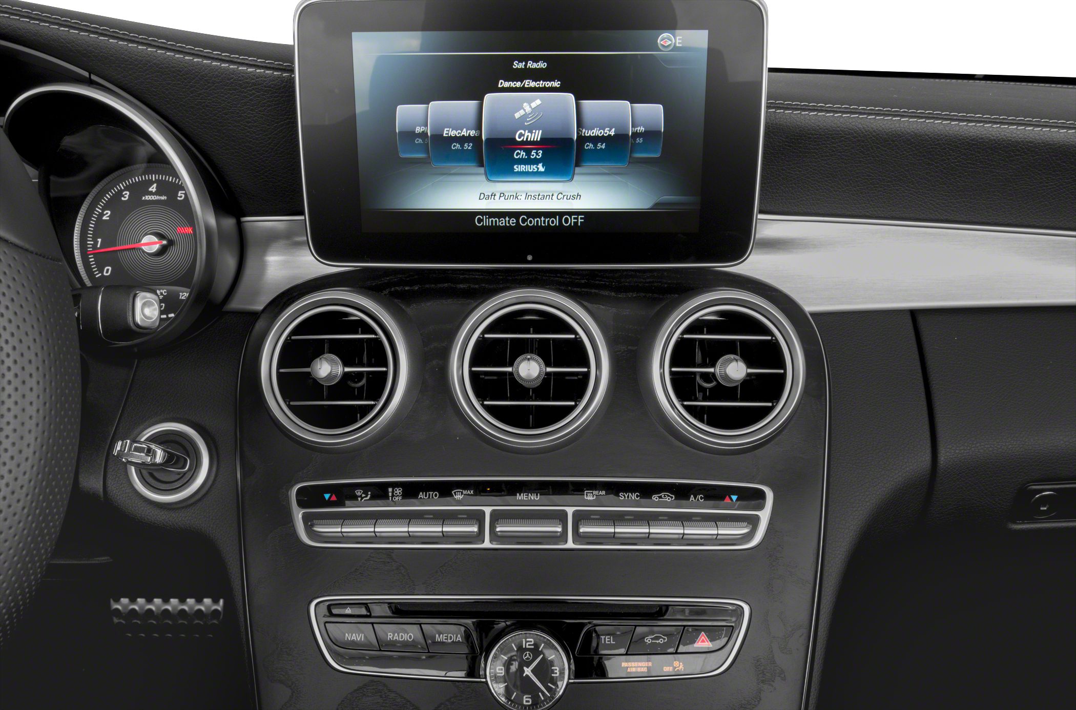 Dashboard with round air vents and central infotainment screen