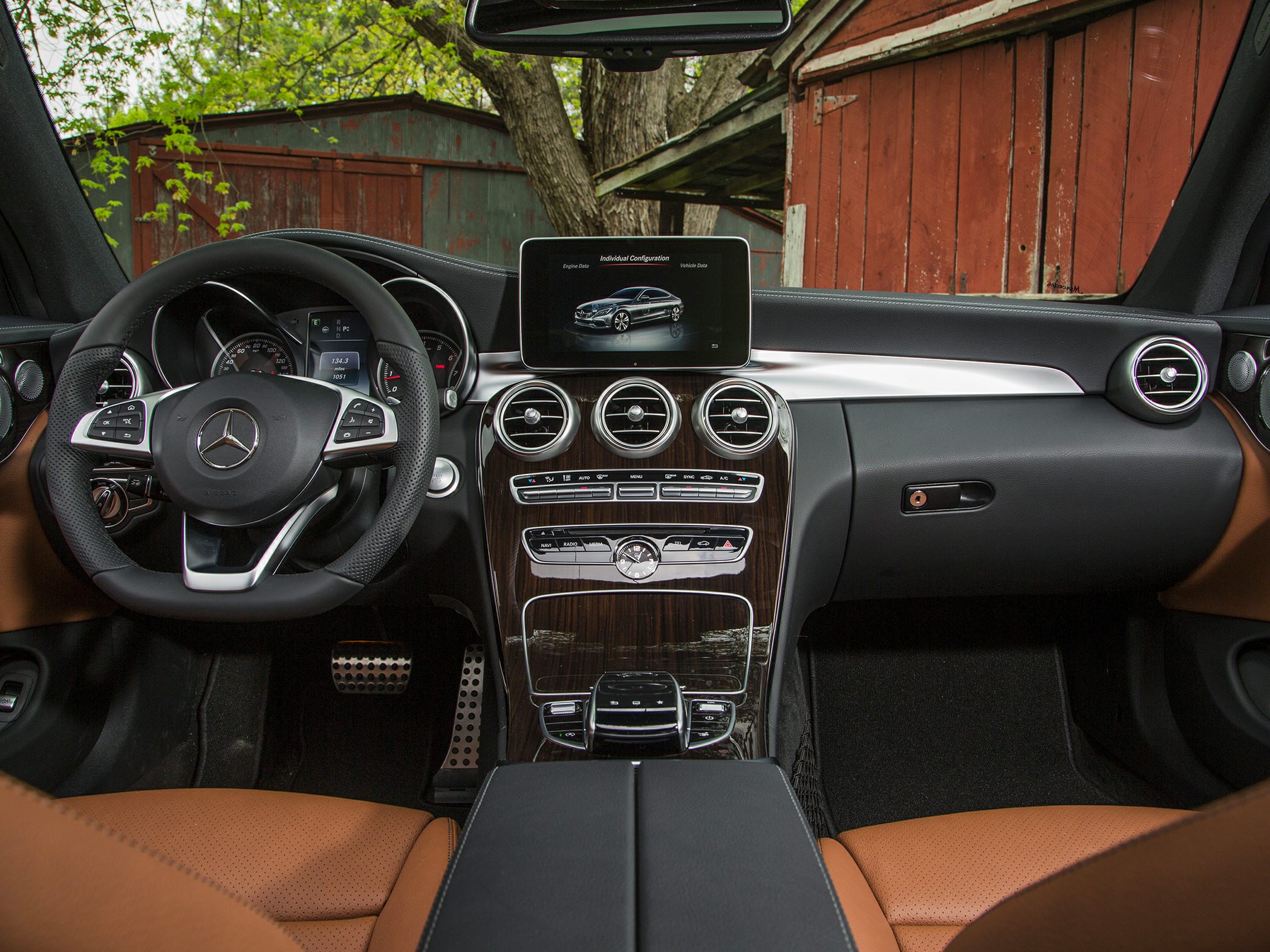 Luxury dashboard with wood trim and touchscreen infotainment