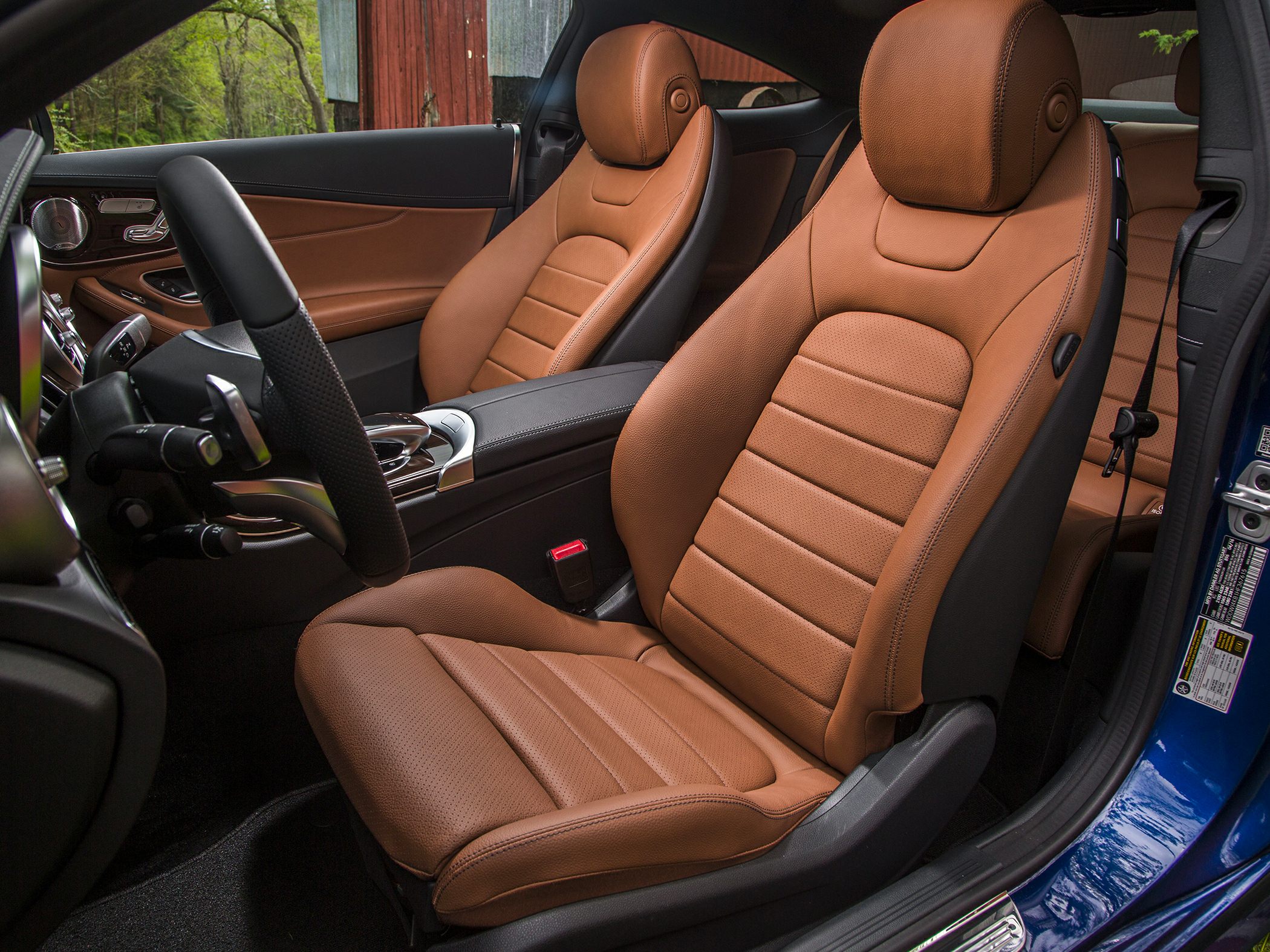 Tan leather front seats with door panel interior design