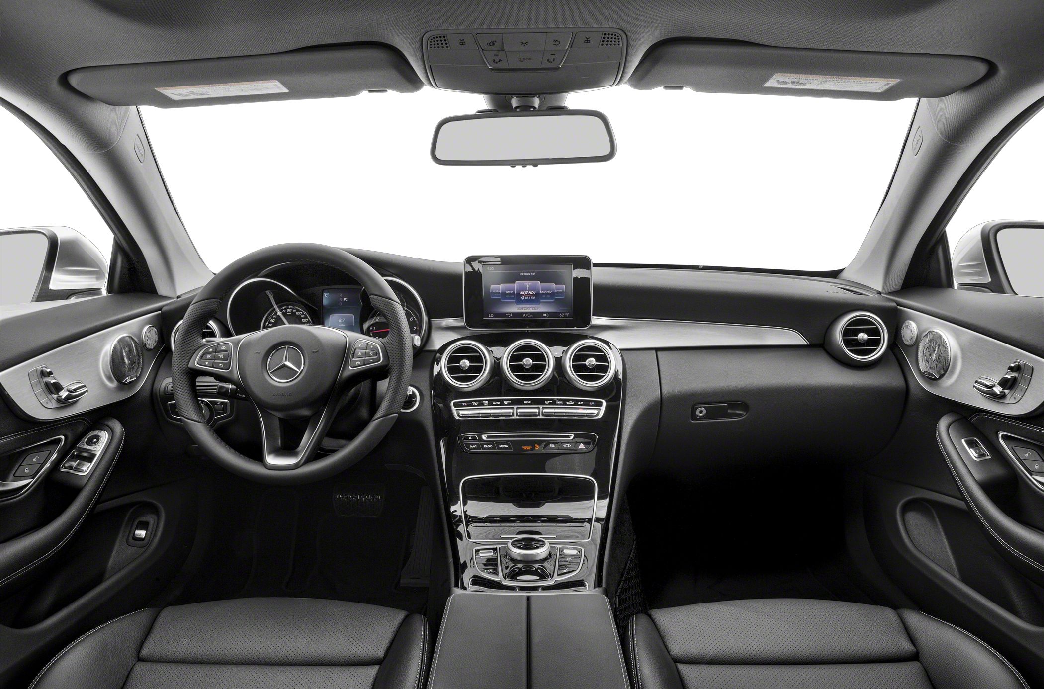 Modern luxury car interior with digital display and circular vents