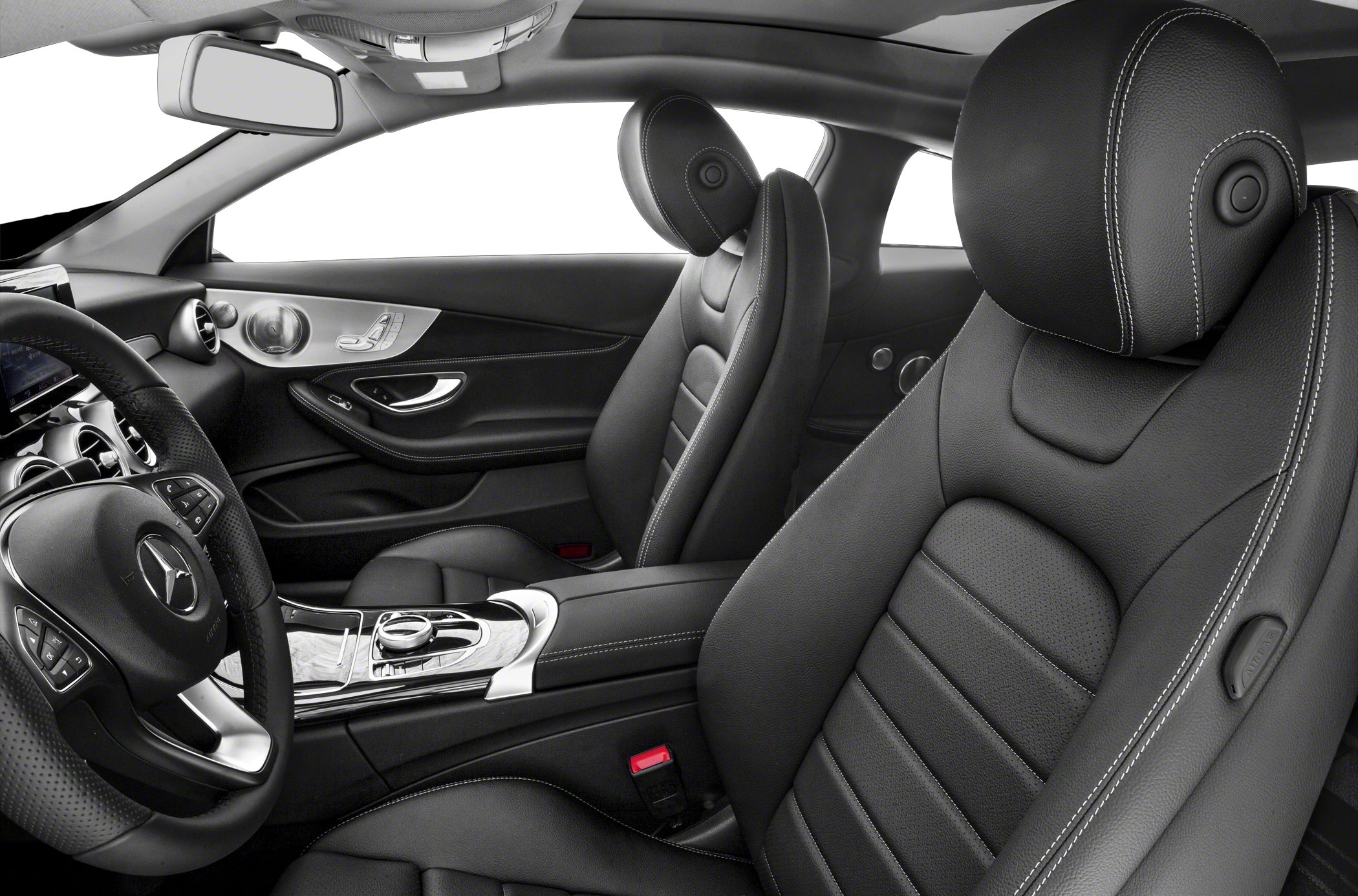 Leather seats and sophisticated driver controls in luxury coupe interior