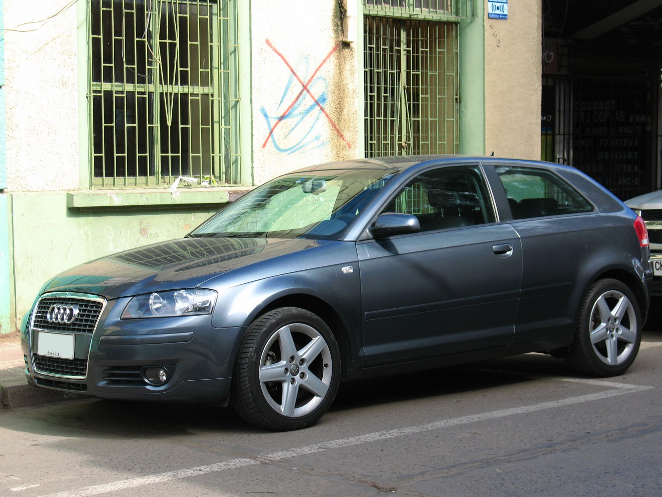 Front side view with alloy wheels of a three-door hatchback