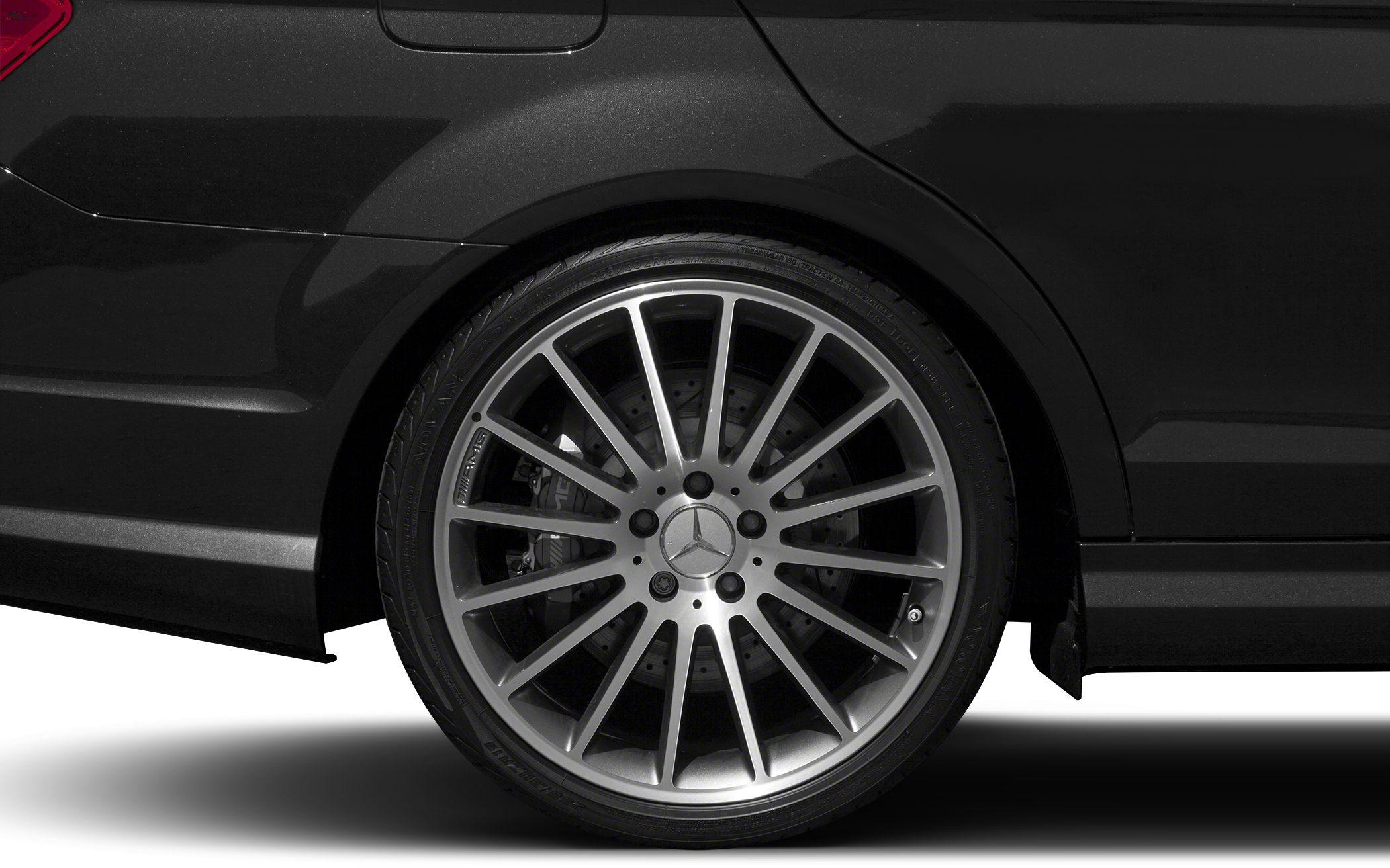 Multi-spoke alloy wheel with visible brake disc on rear side