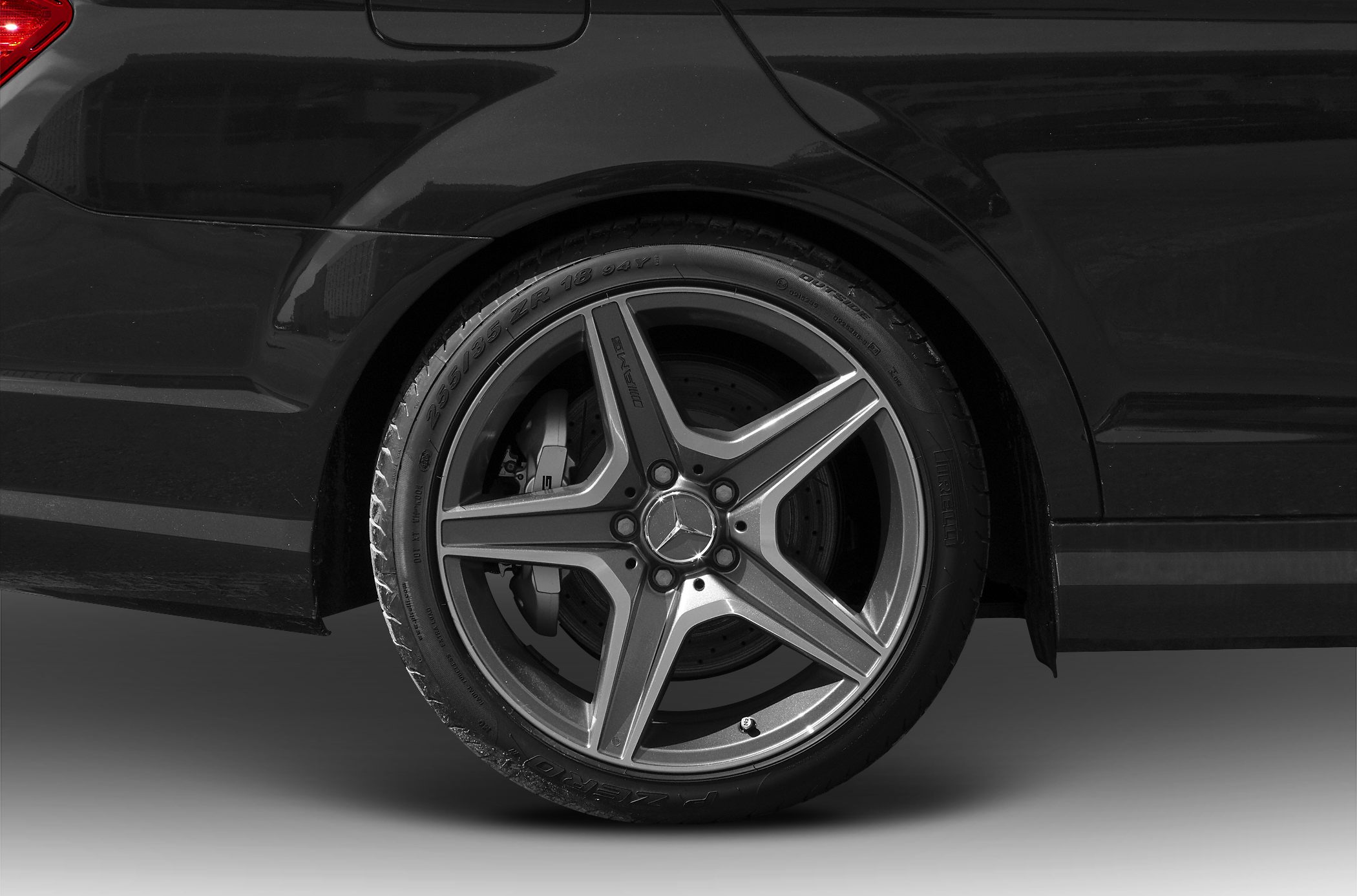 AMG alloy wheel and brake caliper close-up with tire details
