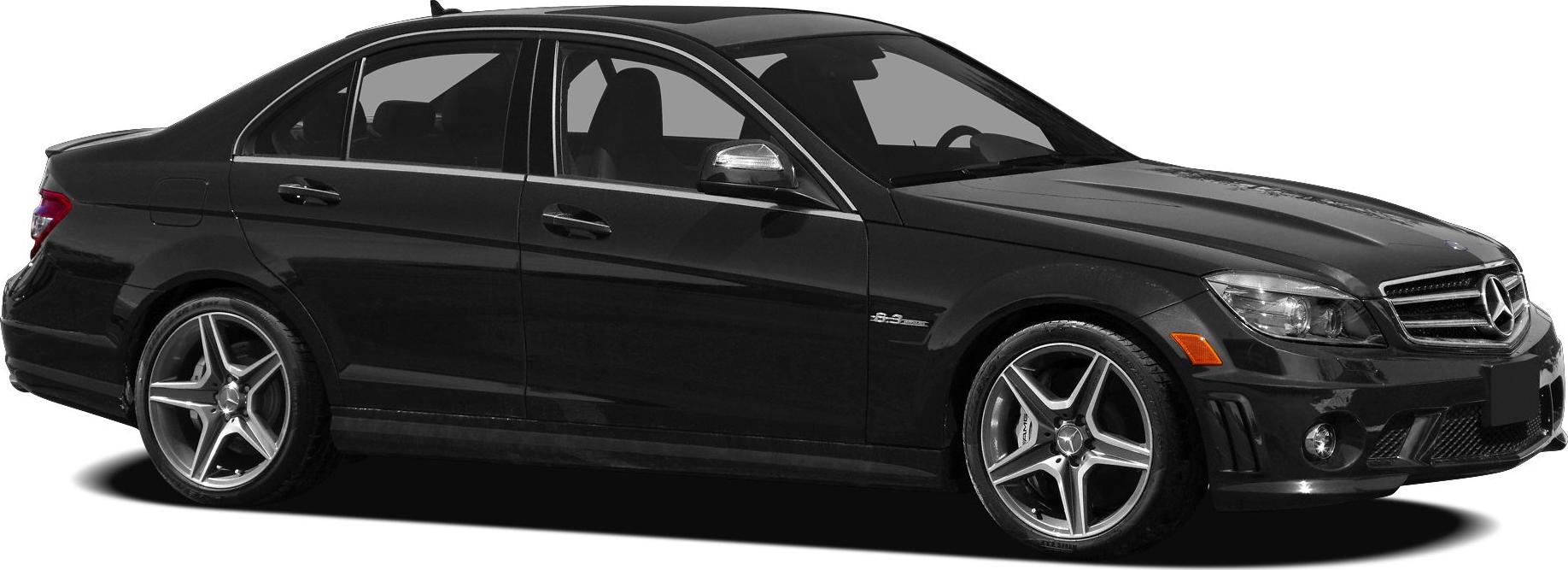 Black sporty sedan with AMG alloy wheels in side profile
