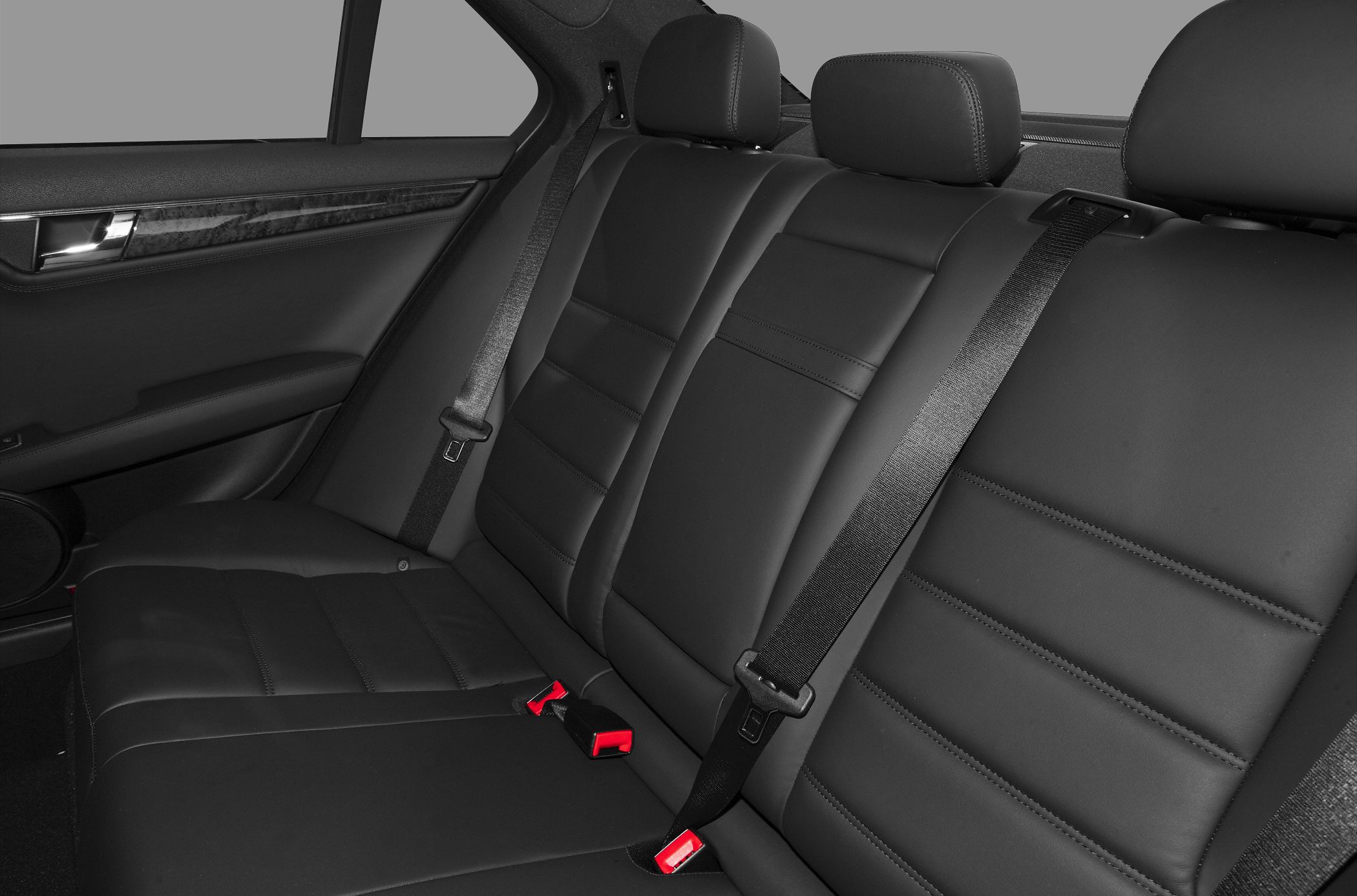 Leather rear seats with headrests and seat belts