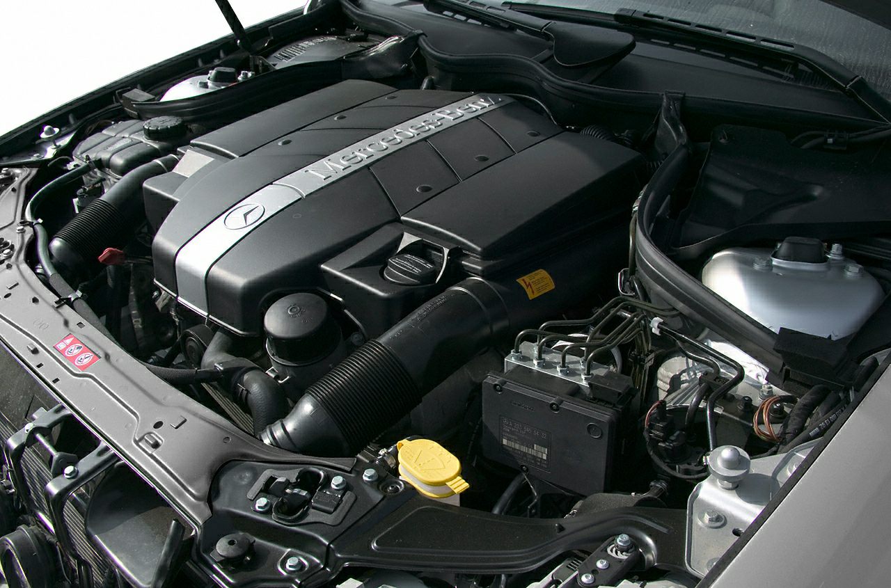 Engine compartment with Mercedes-Benz branded engine cover