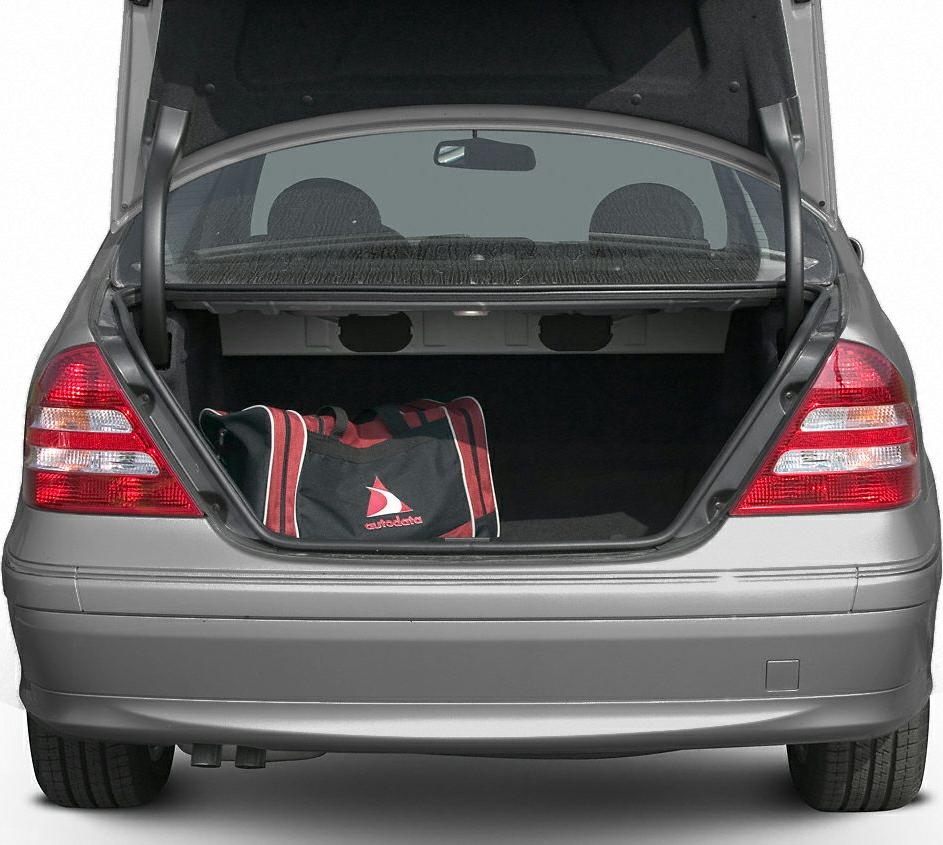 Rear open trunk with visible cargo space and taillights