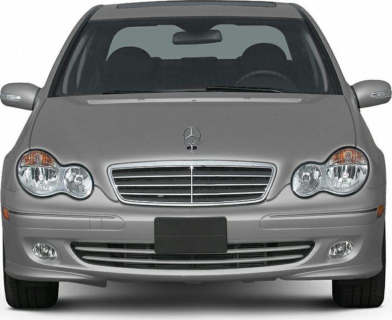 Front view showing headlights, grille, emblem, and bumper of sedan