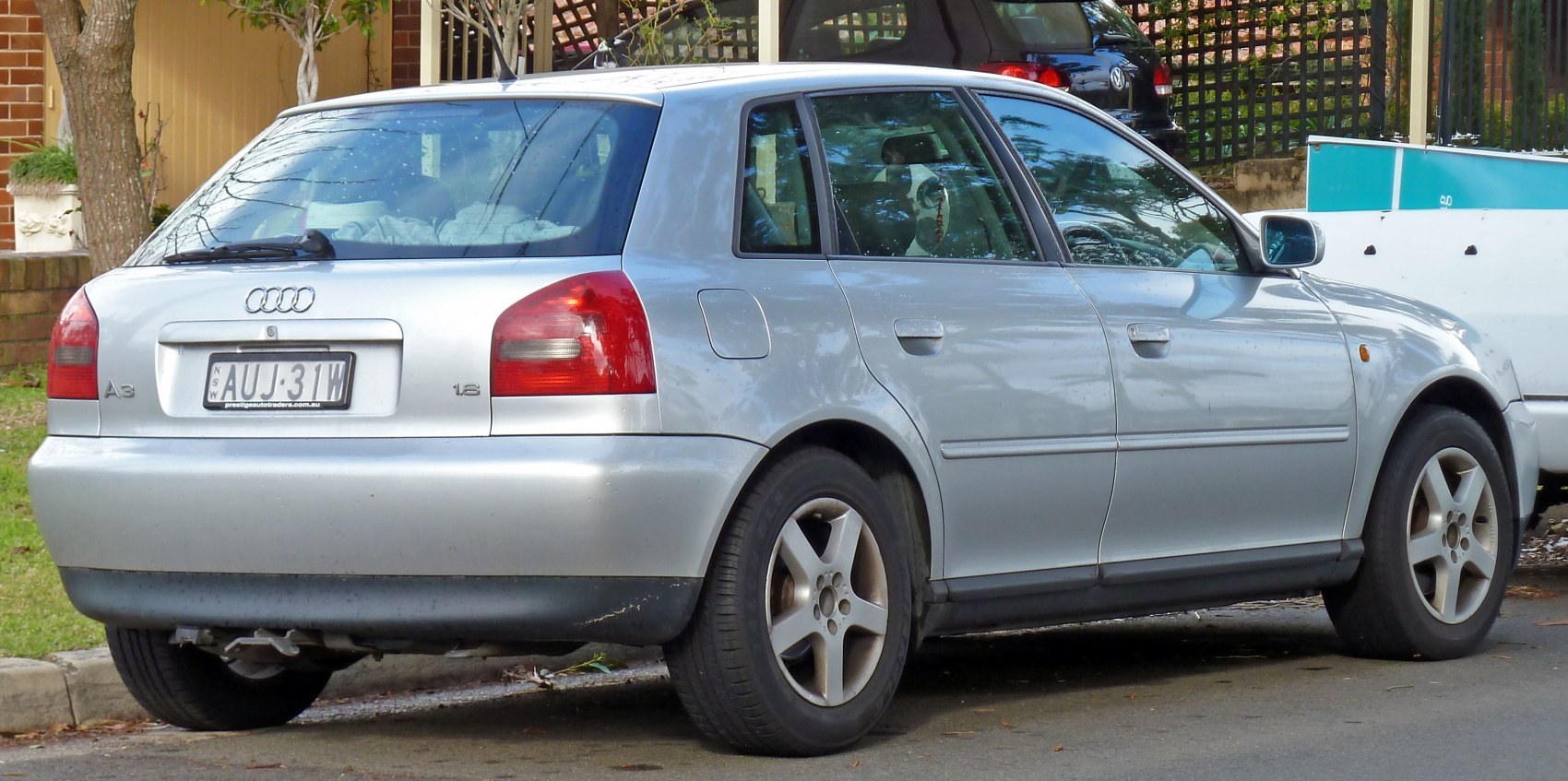Rear and side view of a compact hatchback with distinct rear lights and alloy wheels