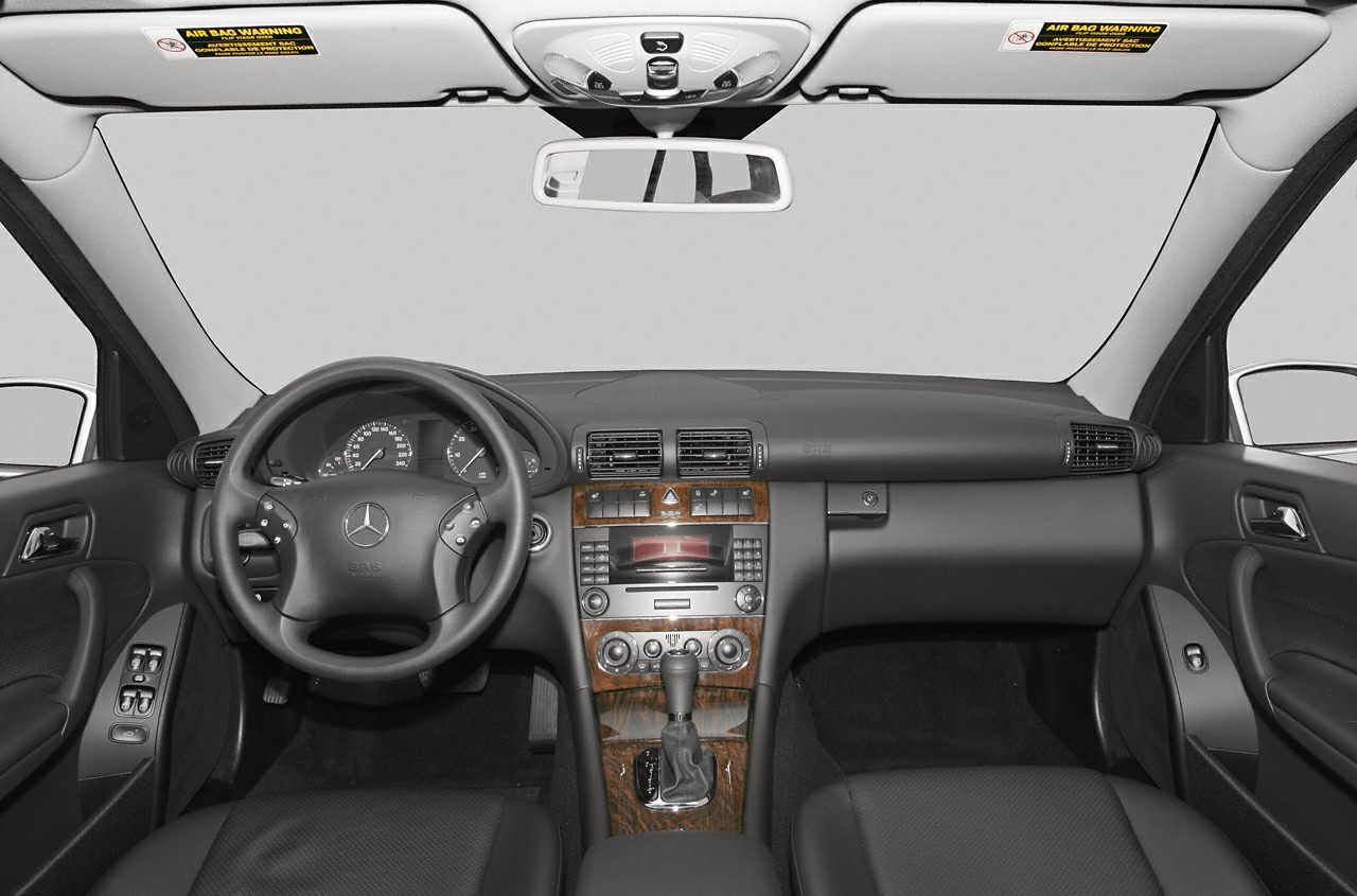 Interior dashboard with wood trim and steering wheel controls