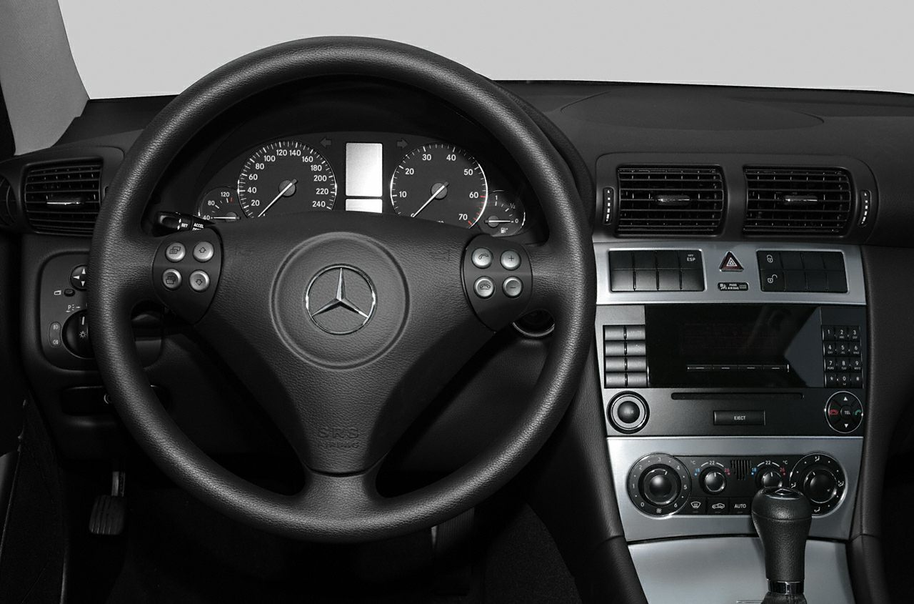 Steering wheel and dashboard with climate control and gauges