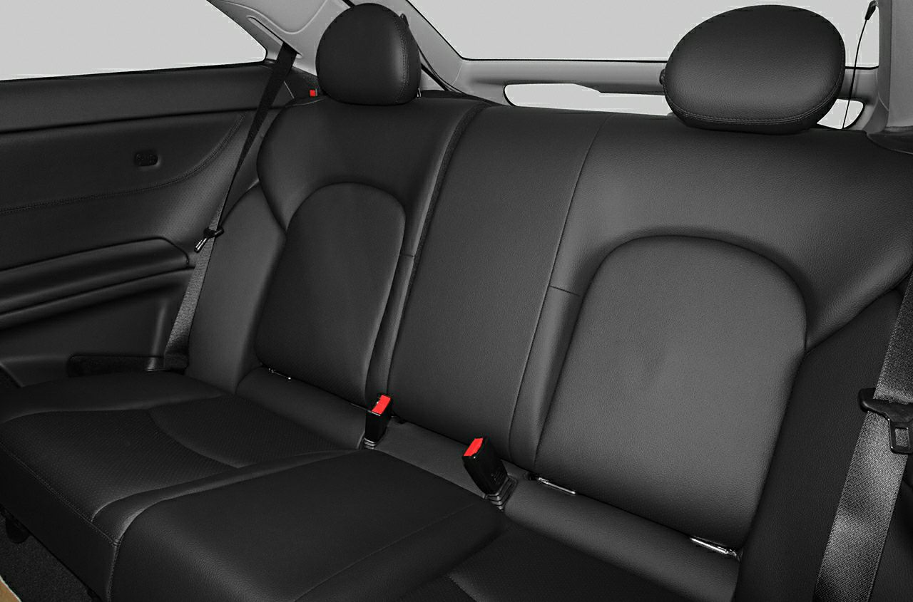 Black leather rear seats with headrests and seat belts